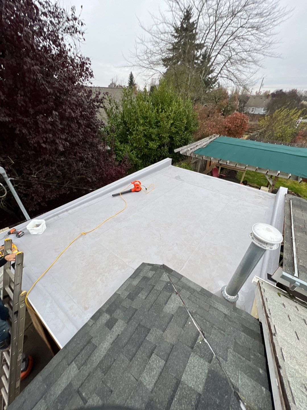 Residential Roof Installation with Added Insulation Barrier  using Malarkey Vista AR Shingles (Color: Storm Grey) by Orezona Building & Roofing Company, Inc.