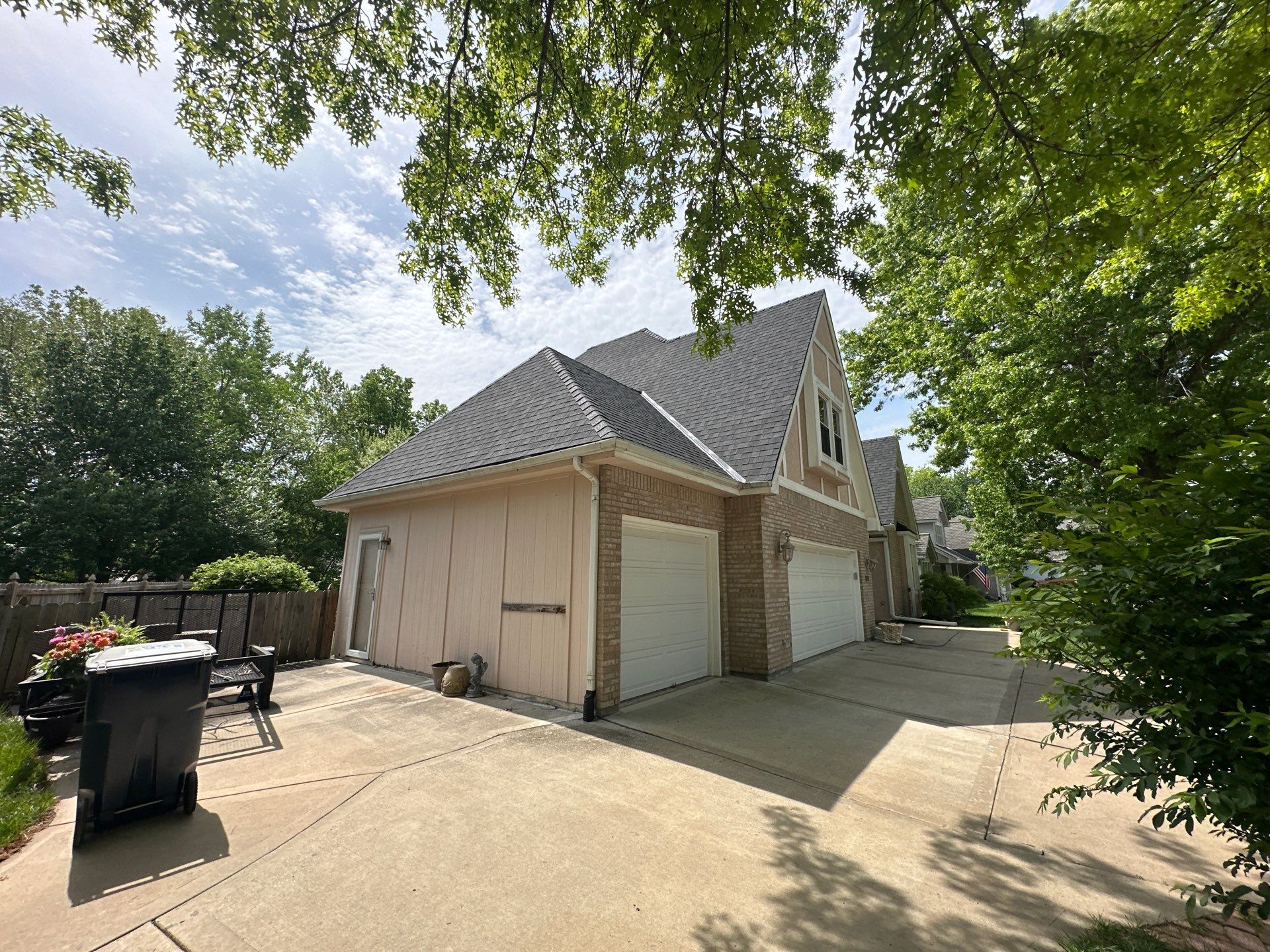 Comprehensive Roof Replacement and Skylight Installation in Kansas City by Liberty Roofing