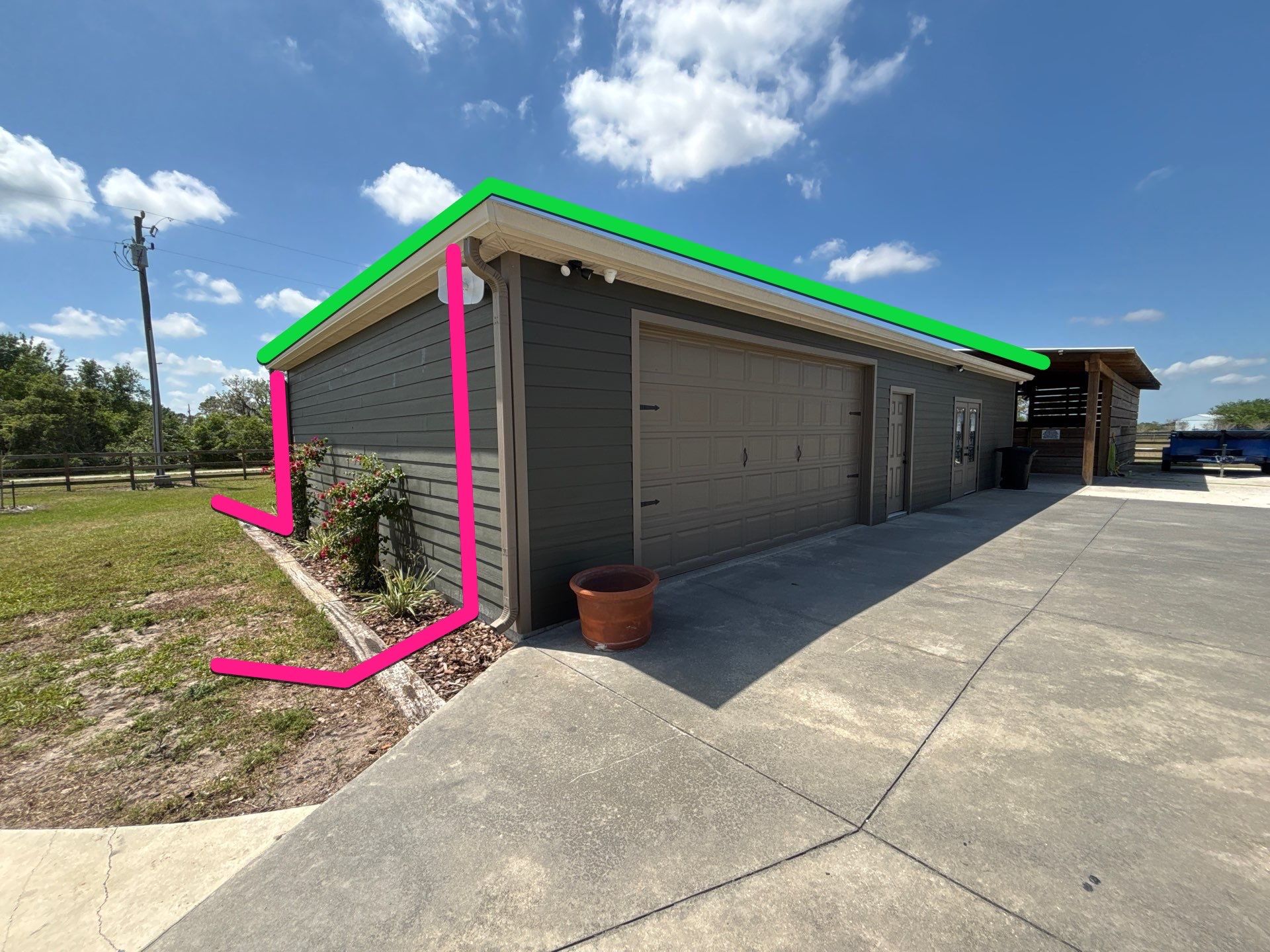  7-inch White seamless gutters and downspouts in Myakka City FL by Gutter Professors