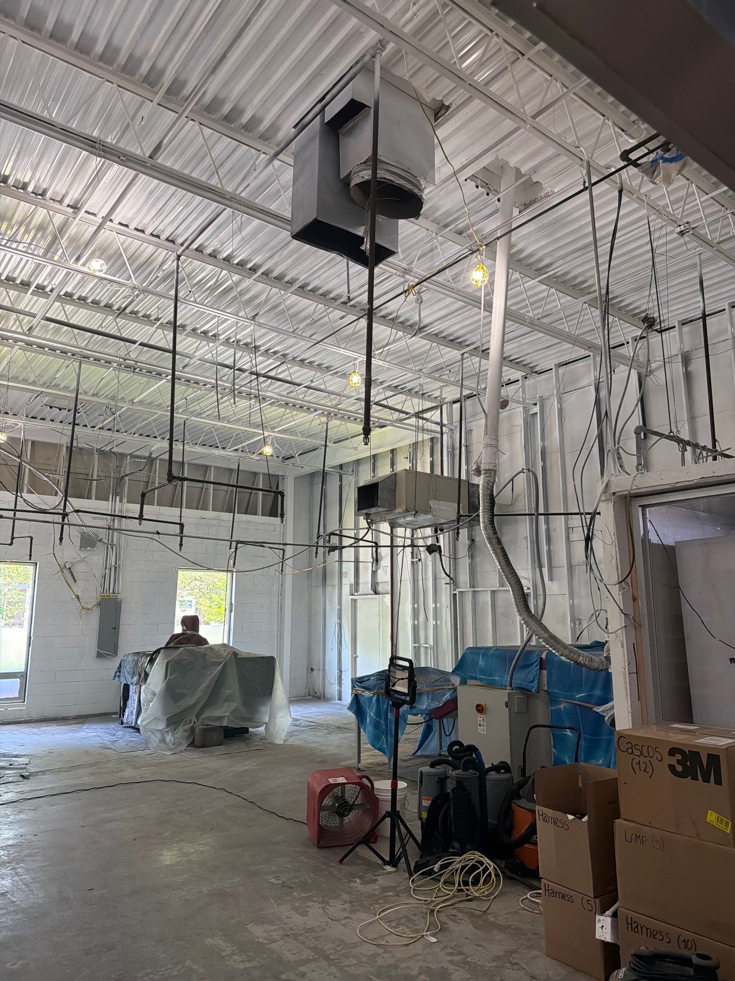 Industrial Warehouse Fire Damage Cleaning and Spray Sealing in Islandia by EMS Restoration Corp