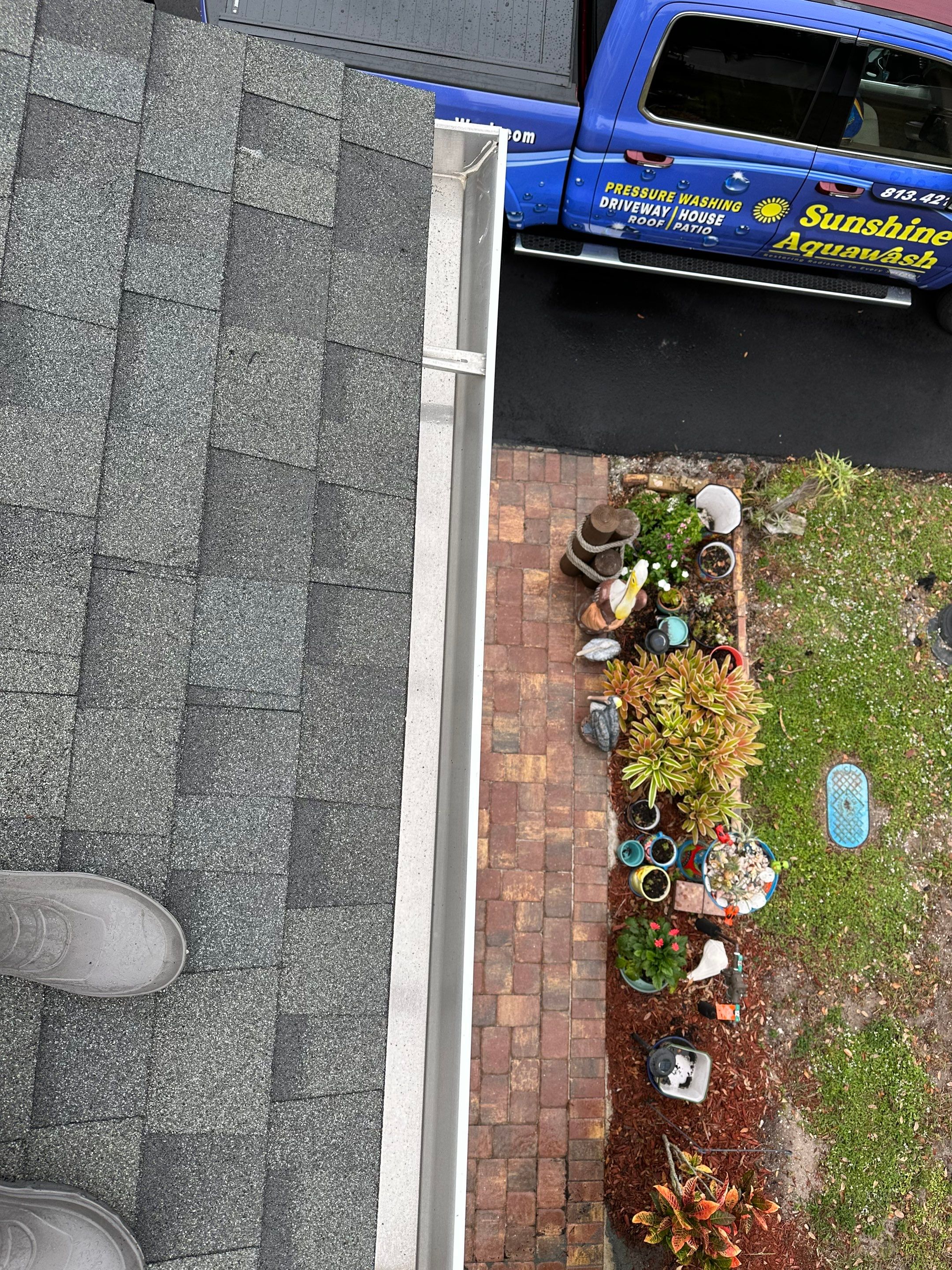 Gutter Cleaning and House Washing Services  by Sunshine AquaWash