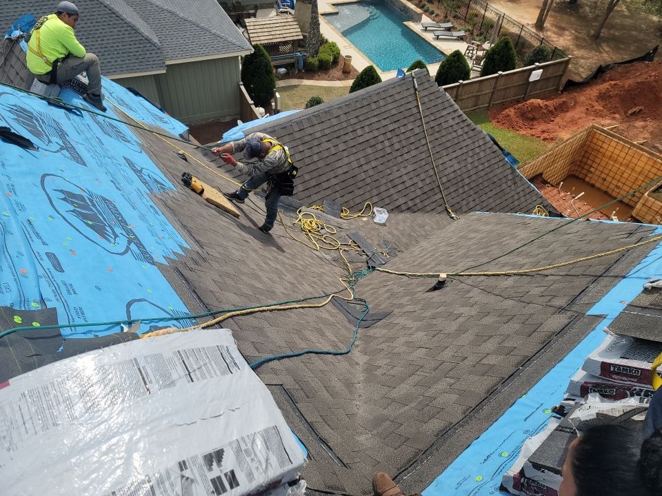 Residential Roofing Installation using Roof Replacement by American Roofing & Construction LLC