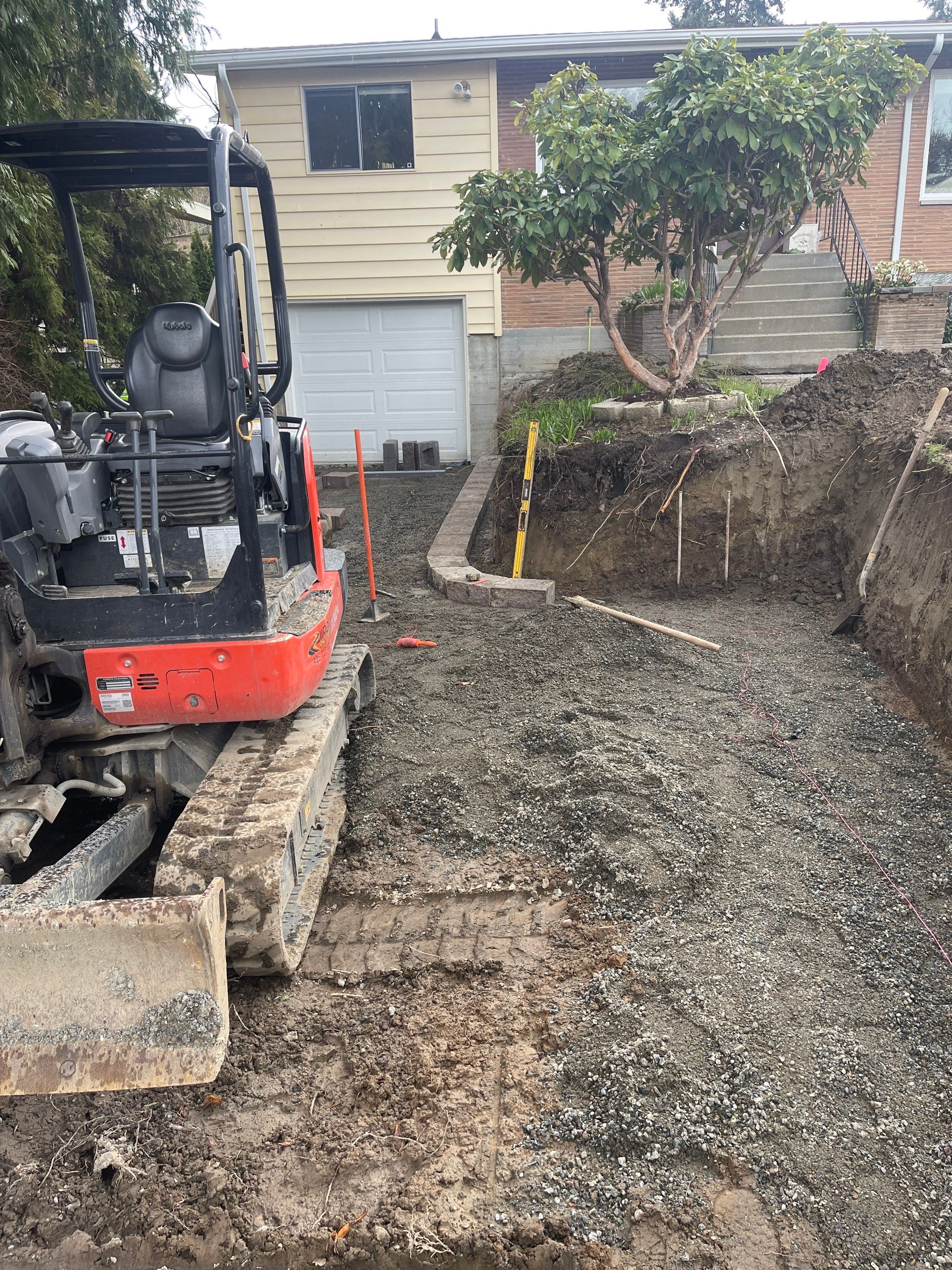 Lorra | Asphalt Driveway Repair & Retaining Wall by Jireh Asphalt & Concrete Inc 