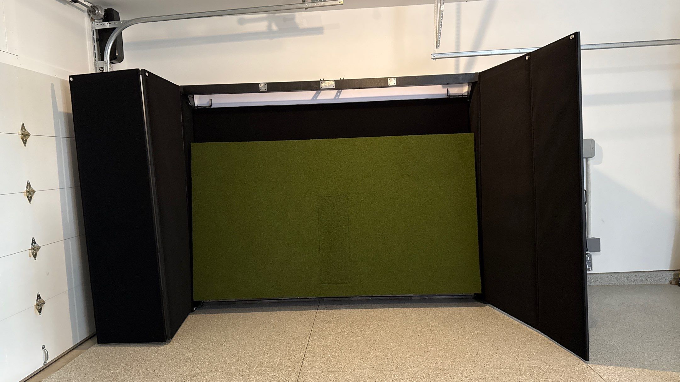 Ben Took It To The Next Level With a Golf Simulator by Banner Garage