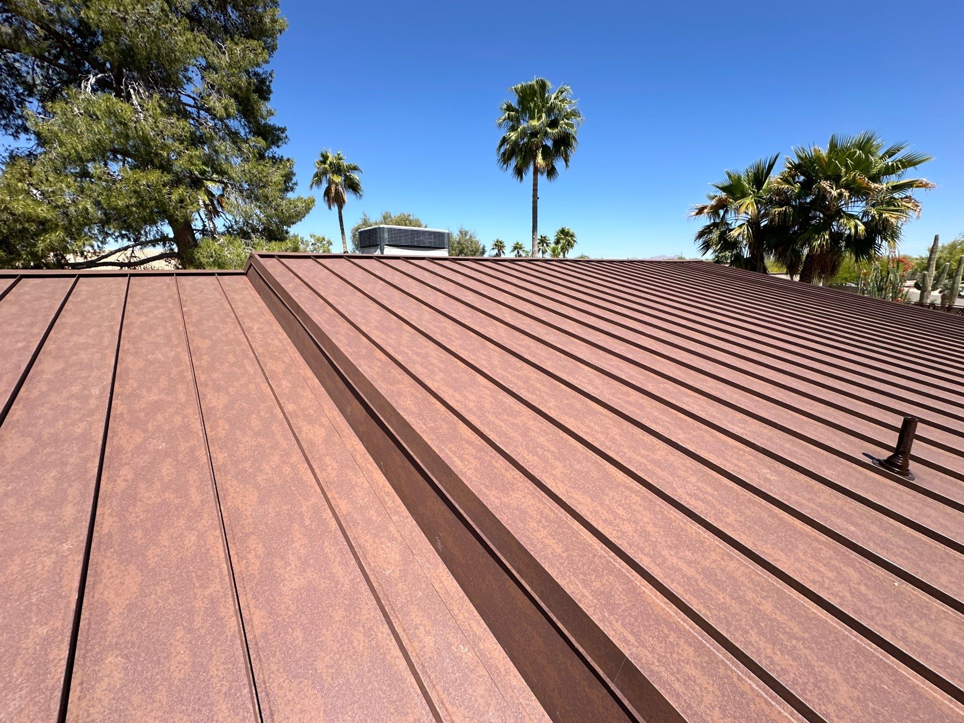 Weathered Rust Standing Seam by Reimagine Roofing