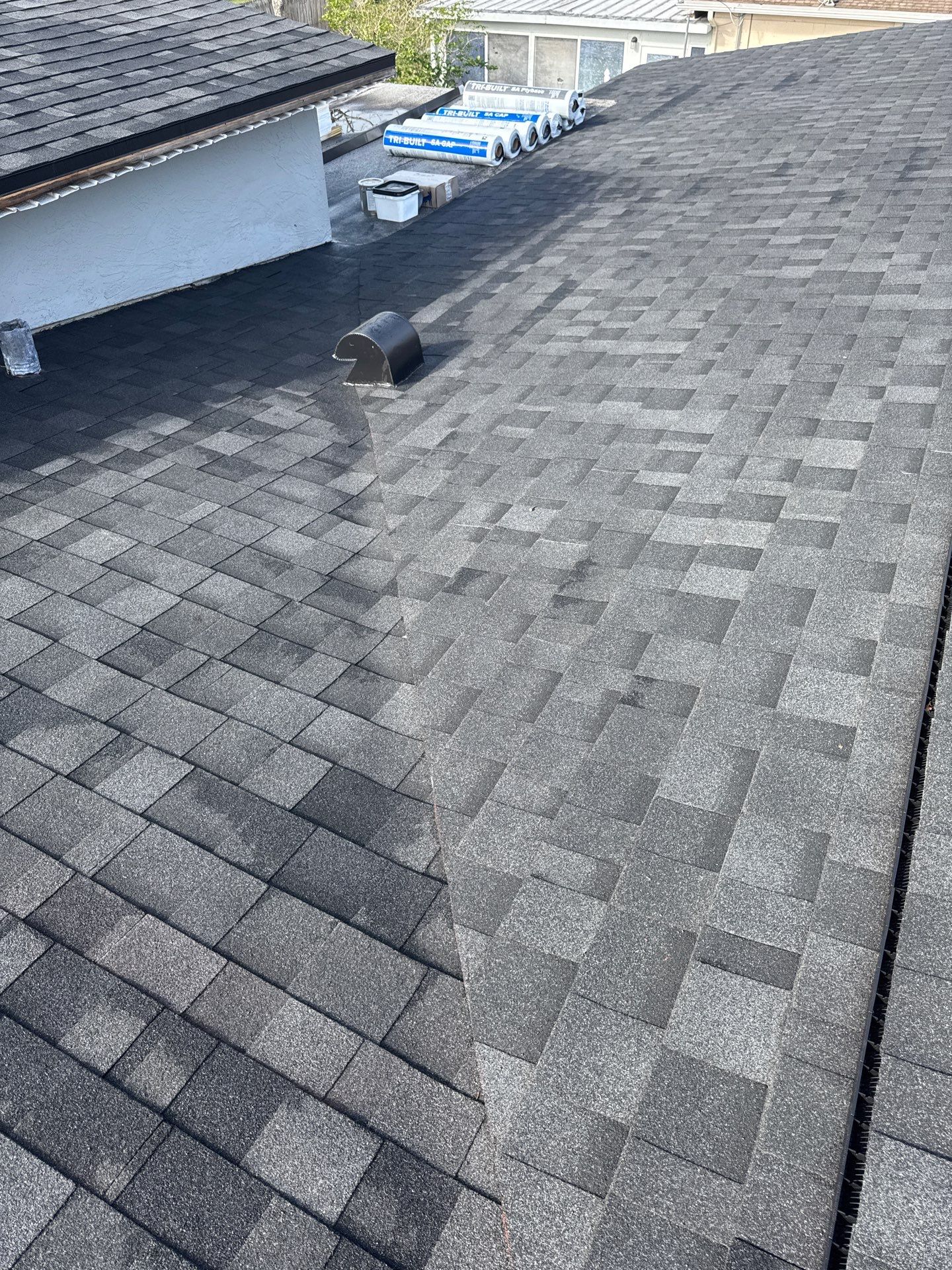 Estate Gray Shingles by Reimagine Roofing