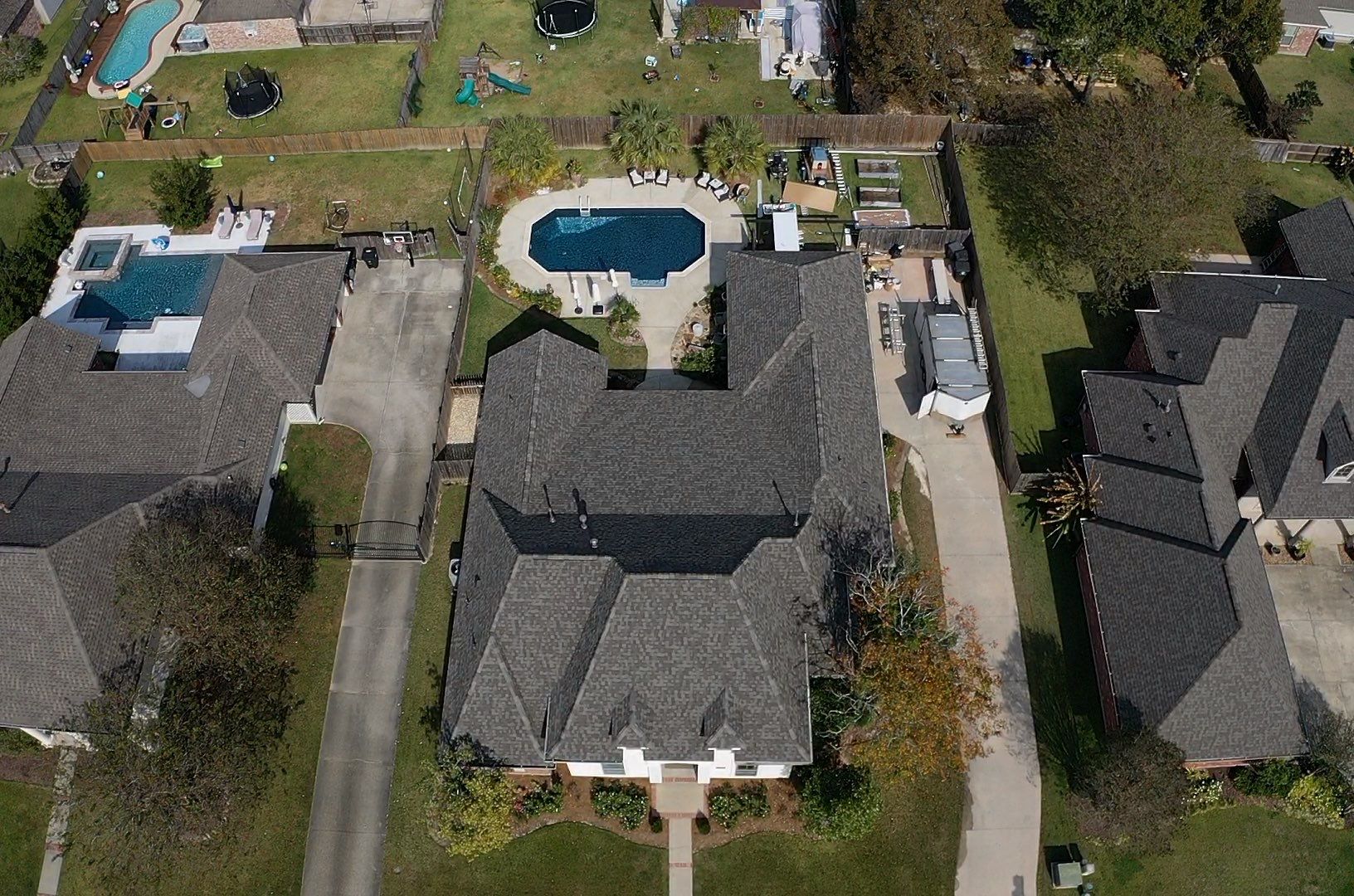 Certainteed Landmark Weathered Wood w patio extension by Top Team Roofing & Construction
