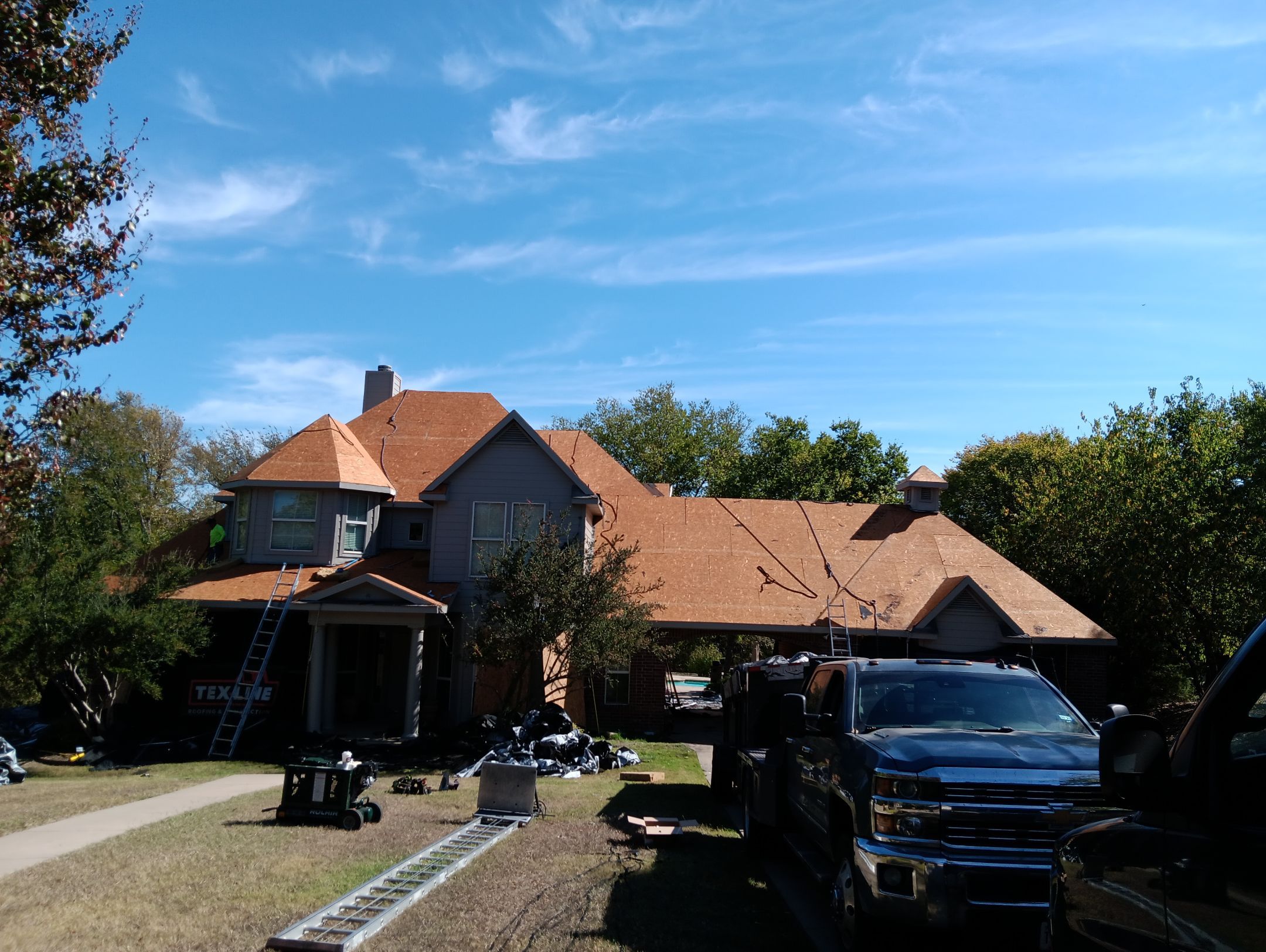 Insurance Claim Roof Paint and Gutters by Tex-Line Roofing