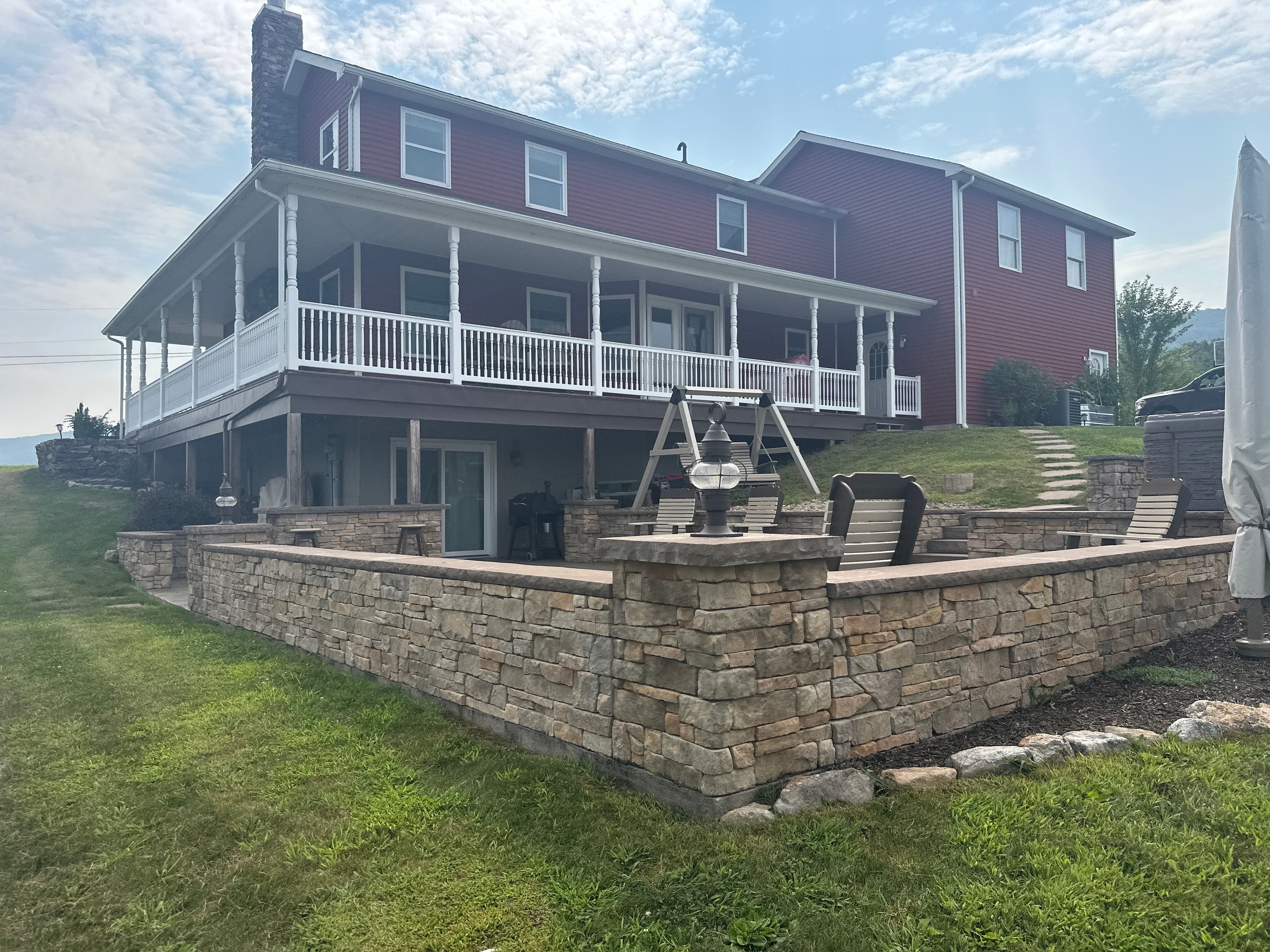 Covered Deck Addition With Custom Gable Roof in Tower City by Esh Builders