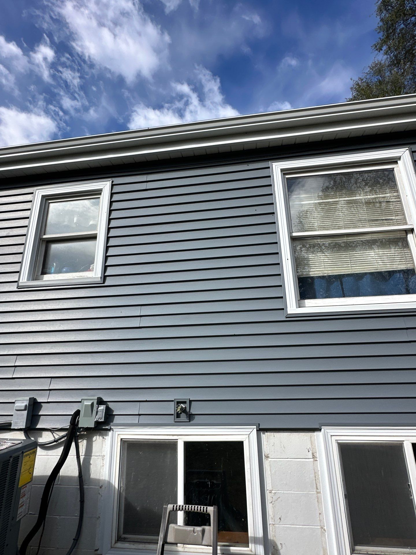Feeling Blue in Weston Mo - Time for a Makeover by EEC Windows, Siding & Roofing
