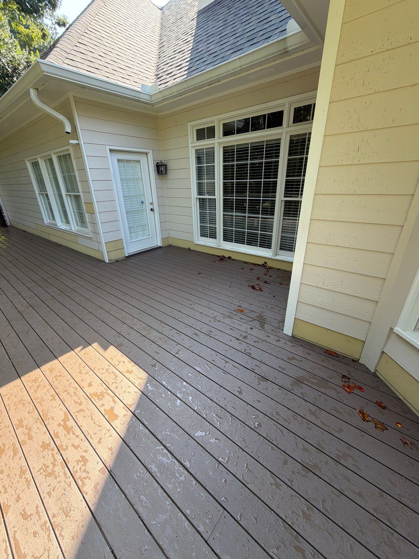 Elevated Composite Deck Replacement with Metal Railings in Smyrna by Swift Home Renovations 