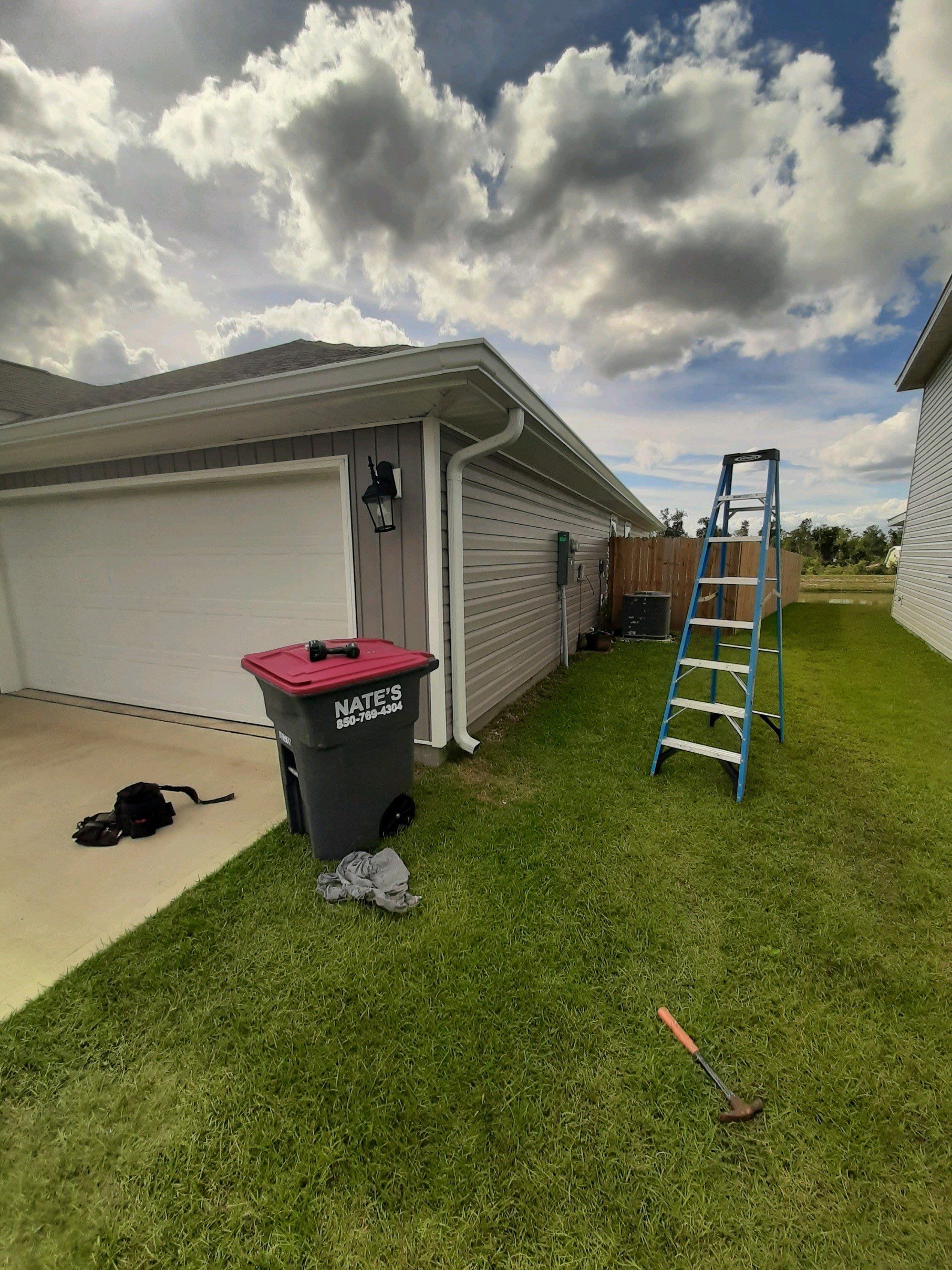 Gutter Installation using K-Style Seamless Gutters and Soffit and Fascia Replacement by Gutter Professors