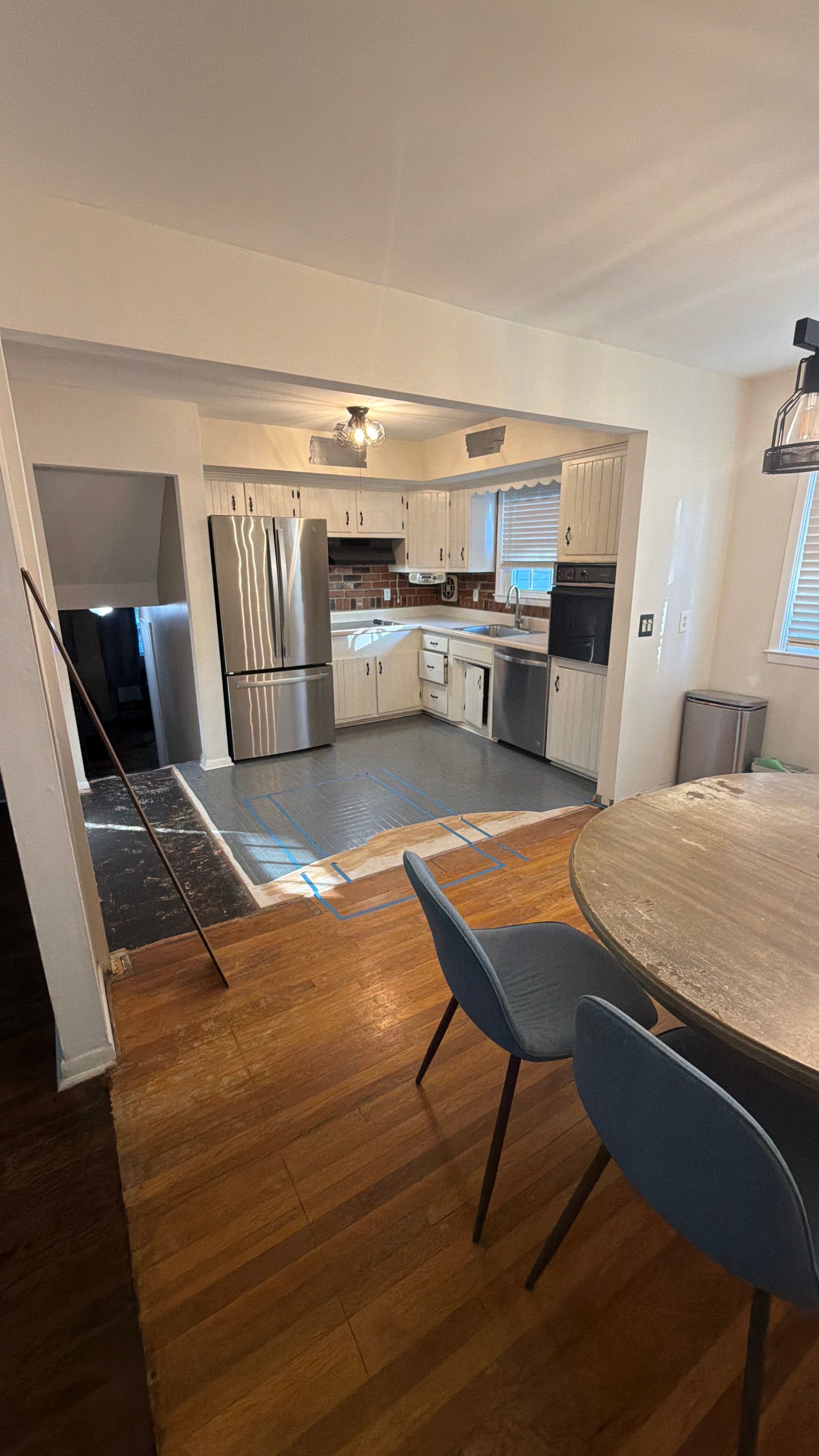 Phoenixville Kitchen Remodel with White Shaker Cabinets and Green Backsplash by Reliable General Contracting