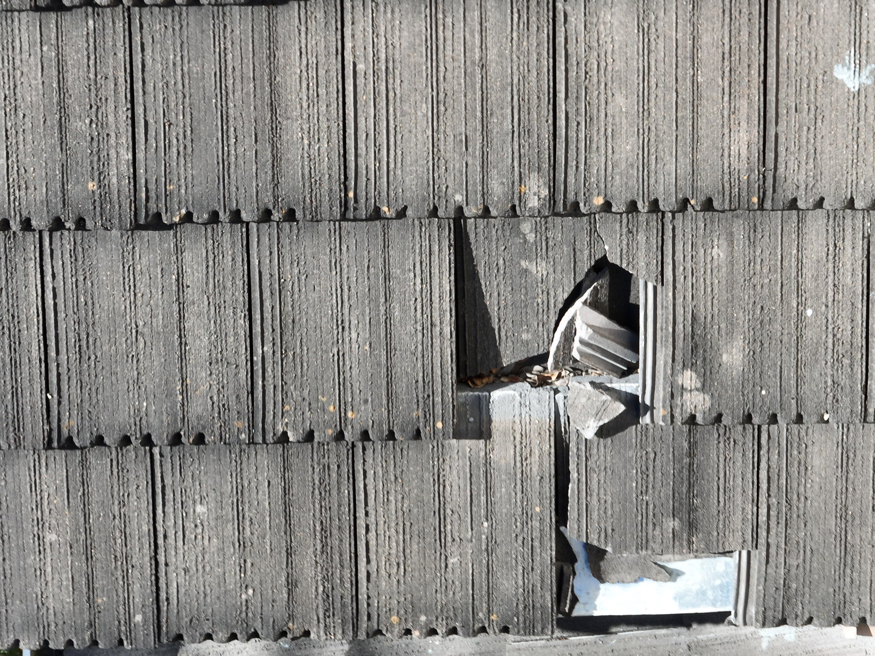 Tile Roof Repair  by Premier Roofing and Contracting