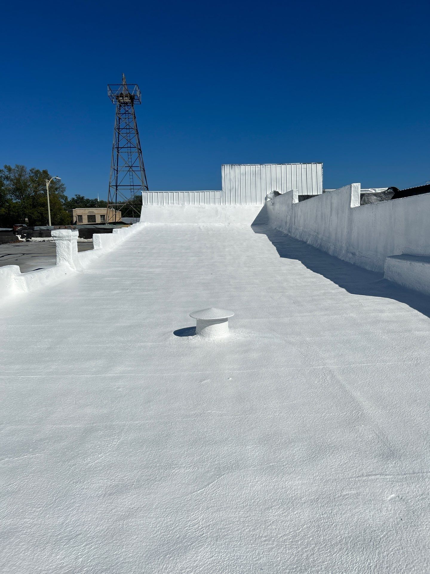 Downtown Gladewater Commercial Foam Roof Restoration – SPF + High-Tensile Acrylic by All Star Roofing LLC