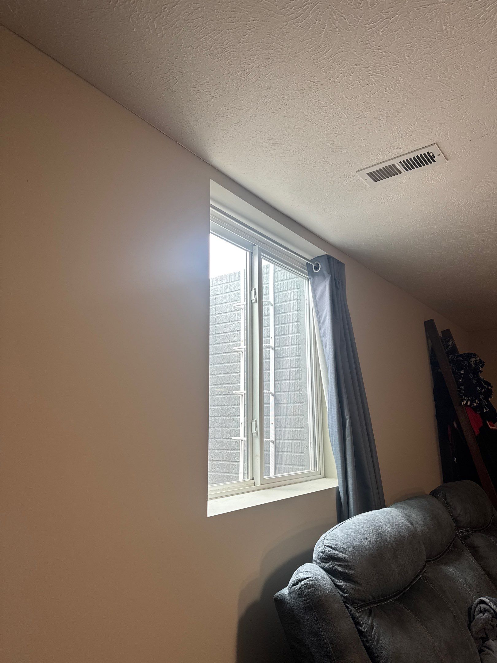 Basement Egress Window Installation with Brick-Textured Wells in Lincoln by CompanyCam Sales Demo