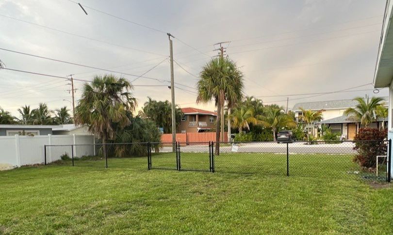 Holmes Beach, FL 4ft. Tall Black Chain-link  by Asap fence and gates, LLC