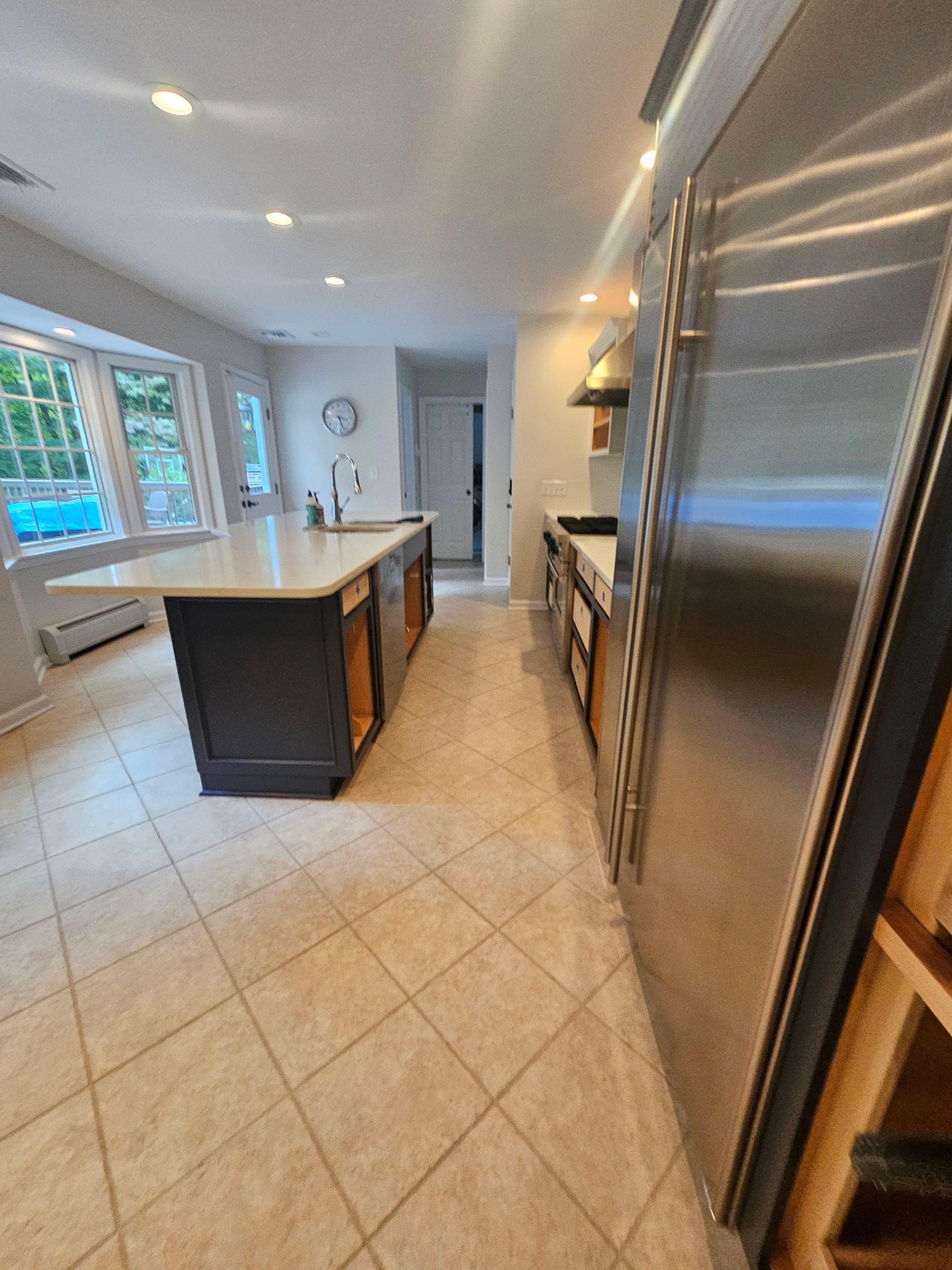 Chic Kitchen Cabinet Refinishing Project by Spectrum Painting, LLC