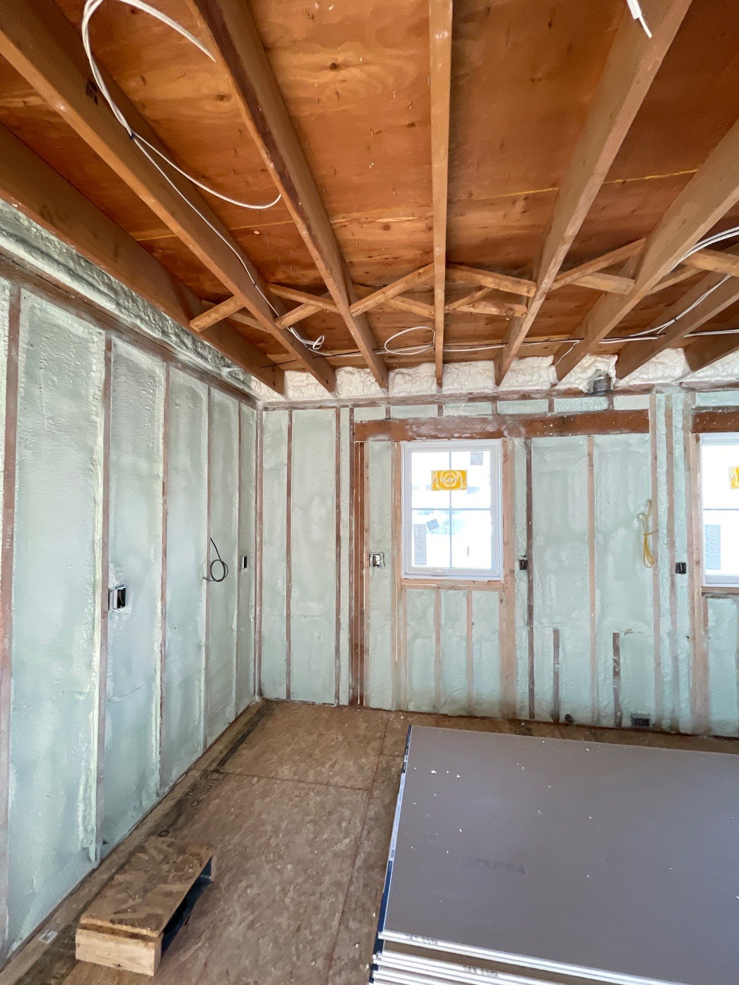 Basement Exterior Walls using Closed Cell Spray Foam by NYS Foam & Energy