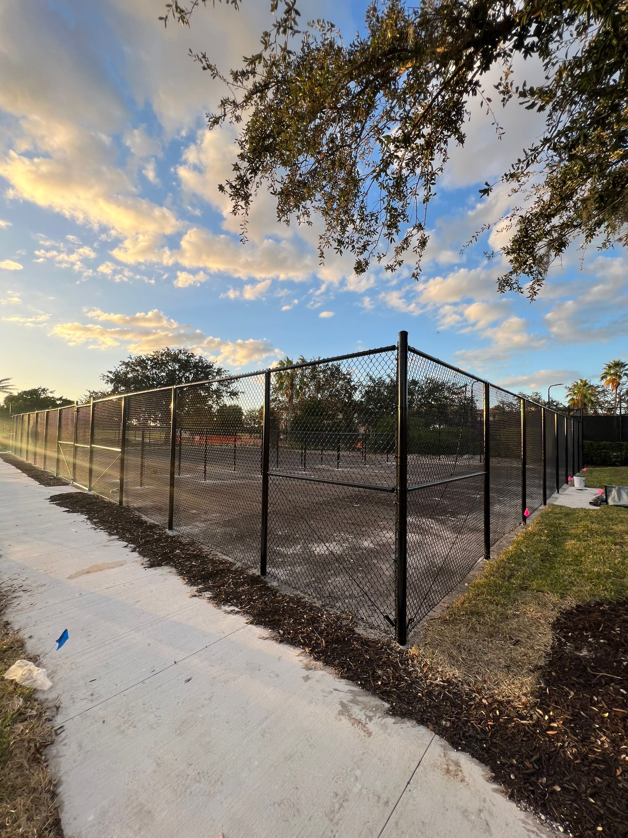 Chain-link Fence Installation using 8Ft Tall Black Chainlink Fence by Asap fence and gates, LLC