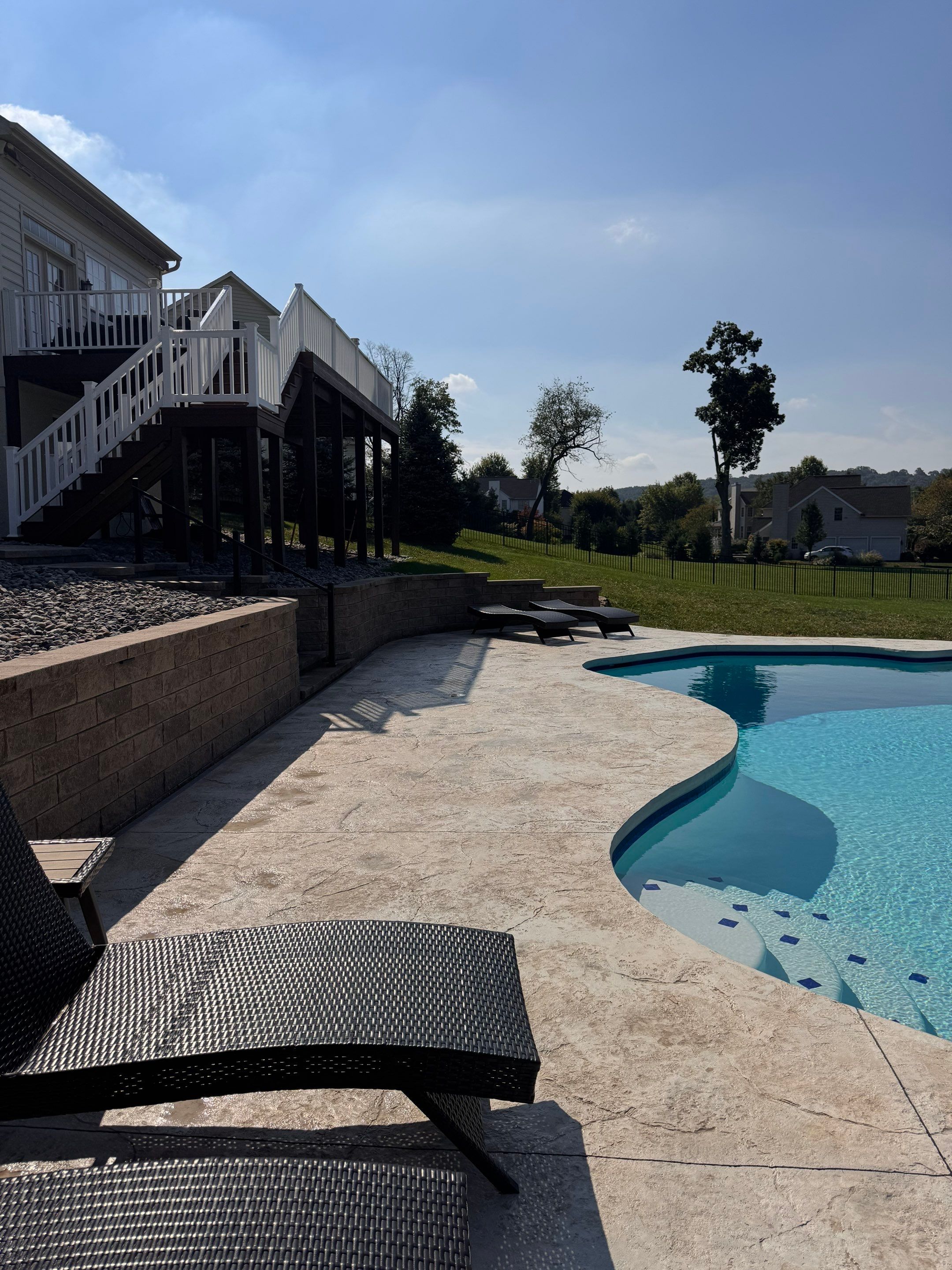 stamped concrete pool deck  by Architectural Concrete Design