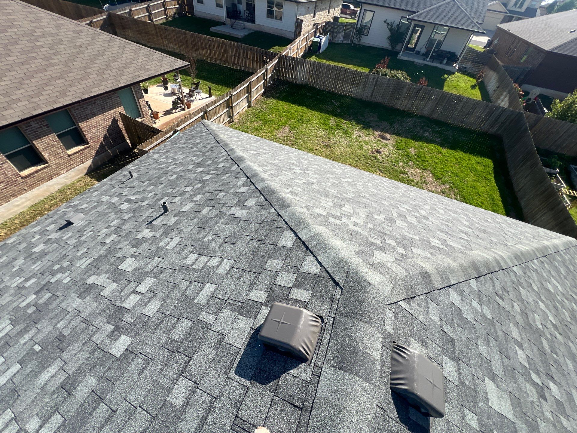 Residential Roofing Installation using IKO Nordic Class 4 Impact Resistant 30yr Architectural Shingles. Color: Castle Grey by WR Roofing Solutions