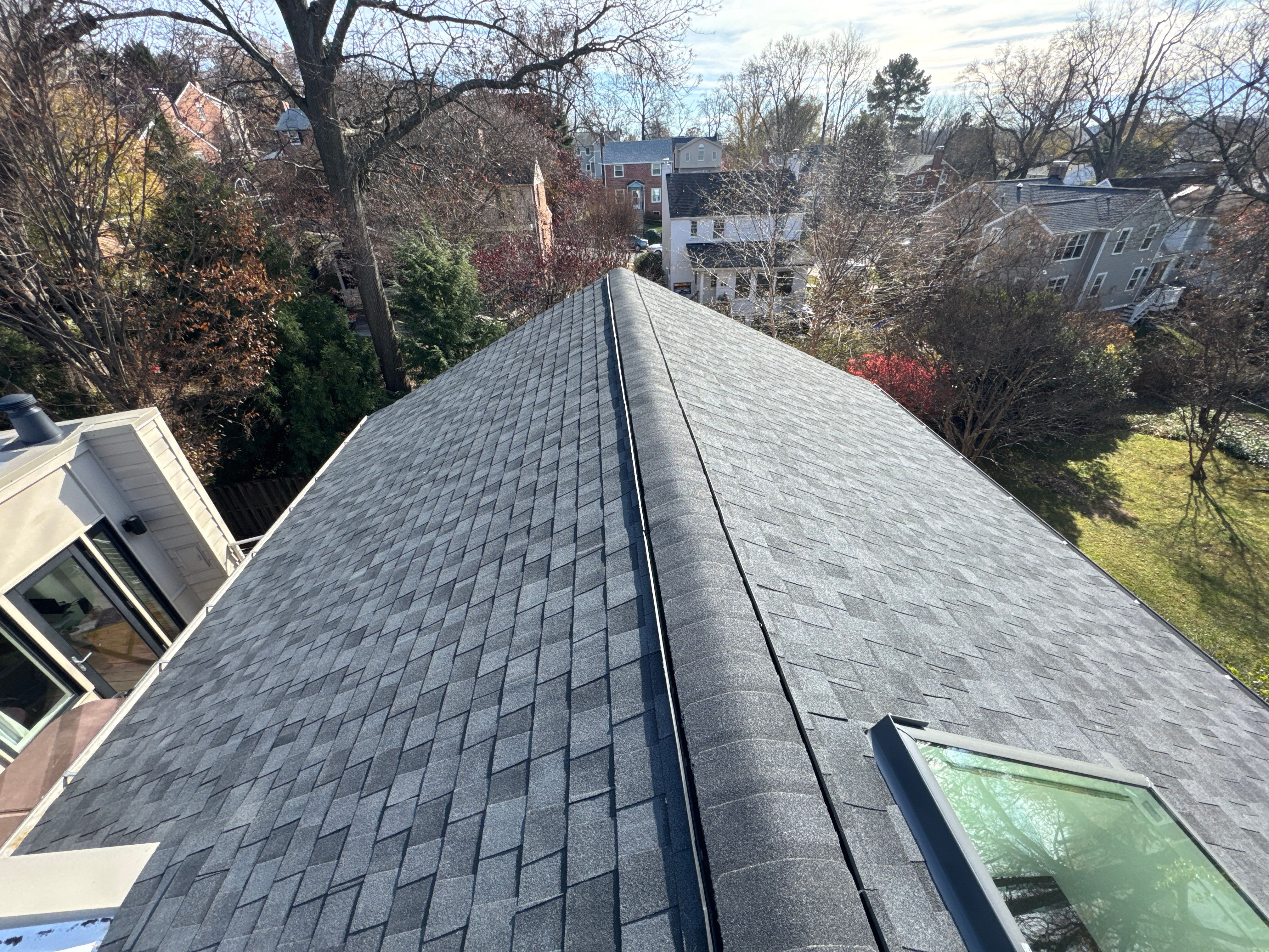 Residential Roofing Installation using Shingle and Flat Roof Combo by USA Storm Roofing and Construction Group