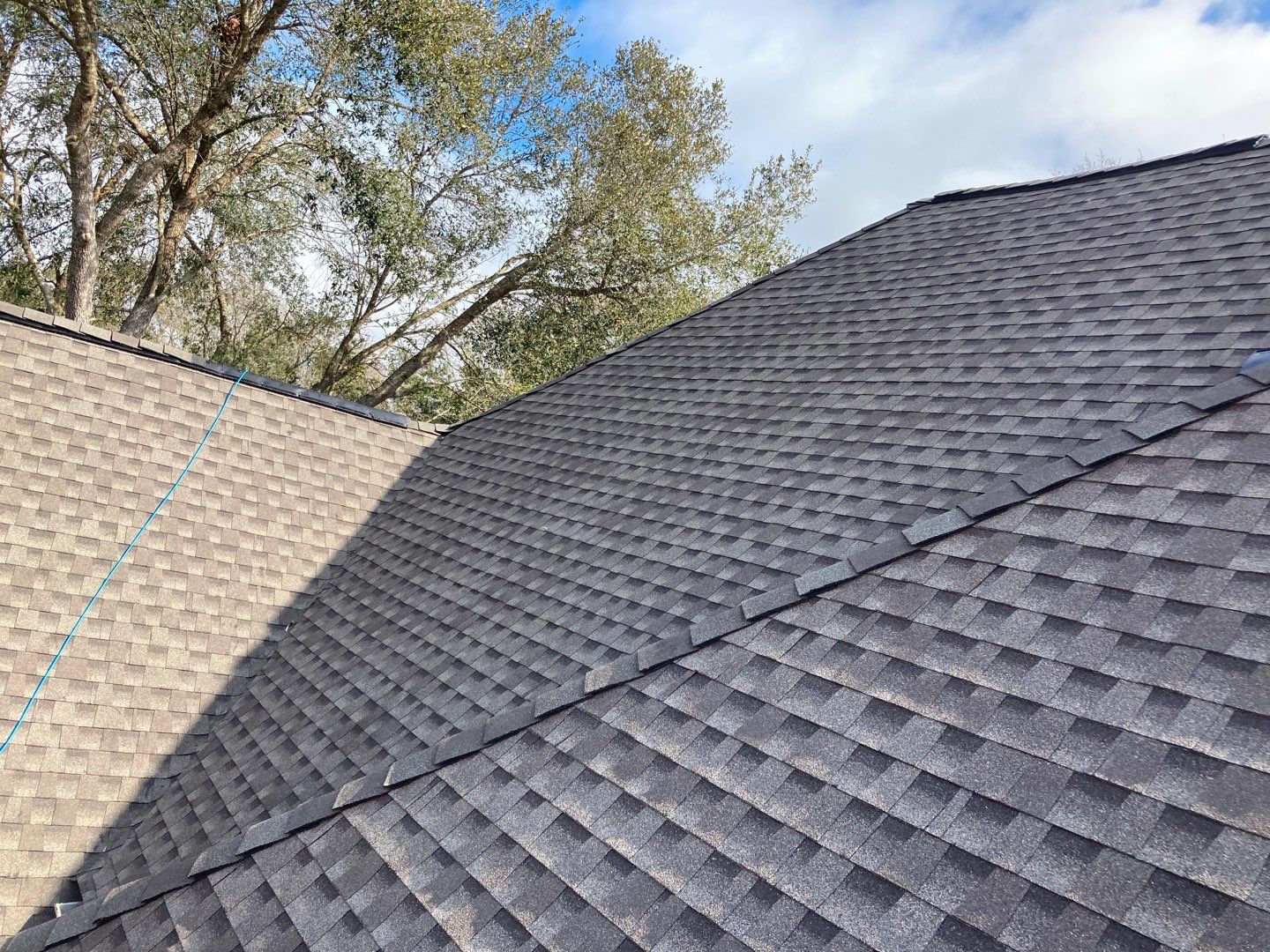 Residential Roofing Installation using Roof Replacement by American Roofing & Construction LLC