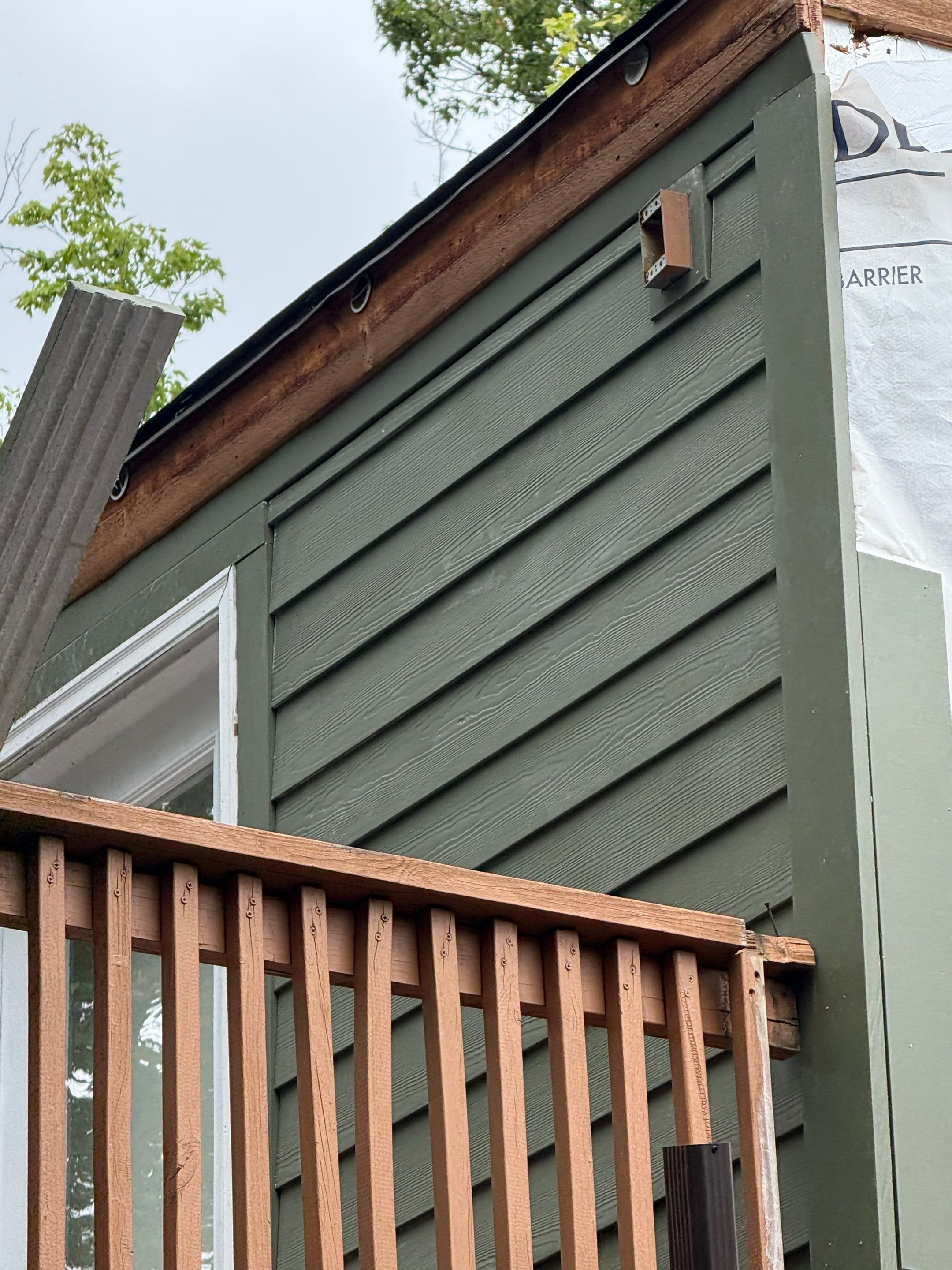 Hardie siding  by Cousins Roofing Siding & Decks