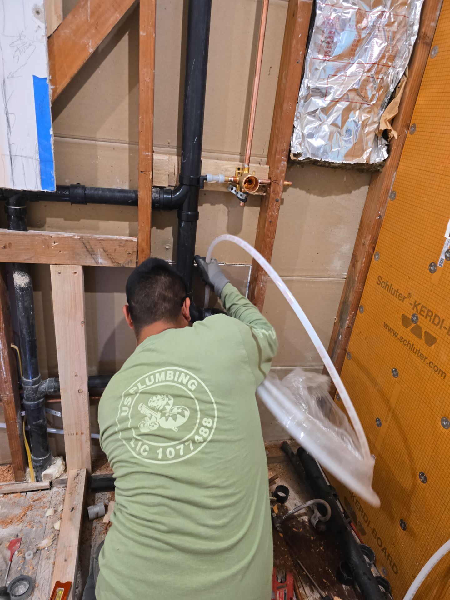 Installation of New Tall Black Piping (Wall to Ceiling) & Underground Piping by Us Plumbing