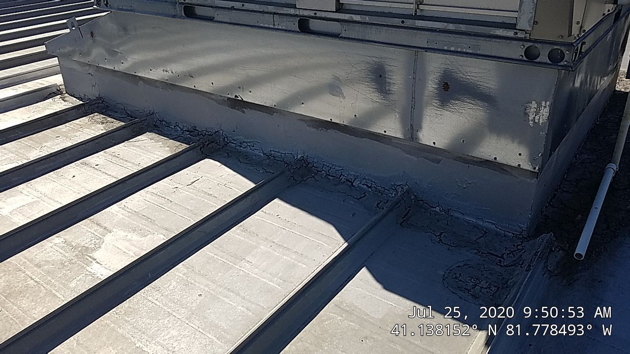 Commercial Metal Roof Coating by Gold Star Roofing LLC