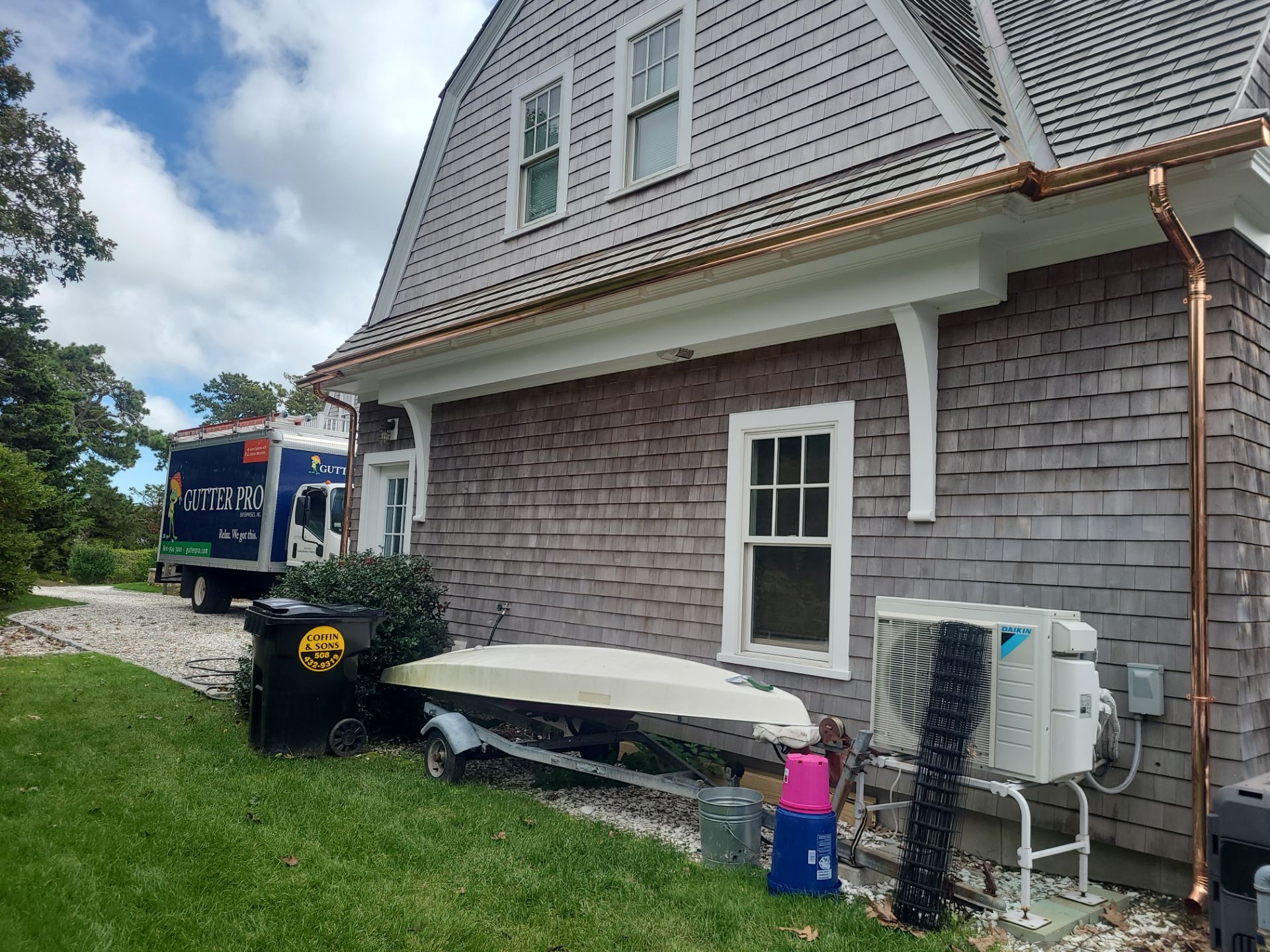 Gutter Installation using 6" Half Round Copper Gutter and Vinyl wedge buildout by Gutter Pro Enterprises