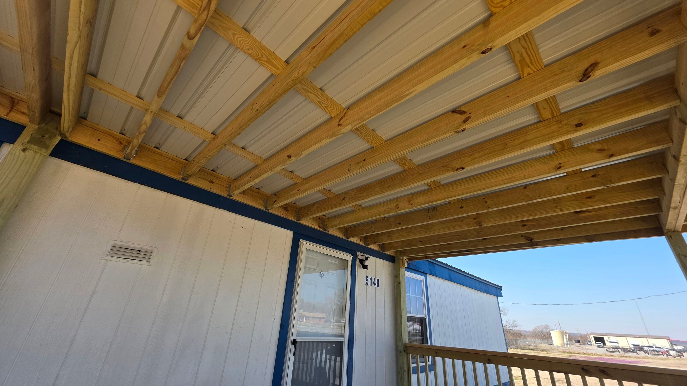 Covered Deck w/ ADA Ramp by In & Out Construction & Remodeling, LLC