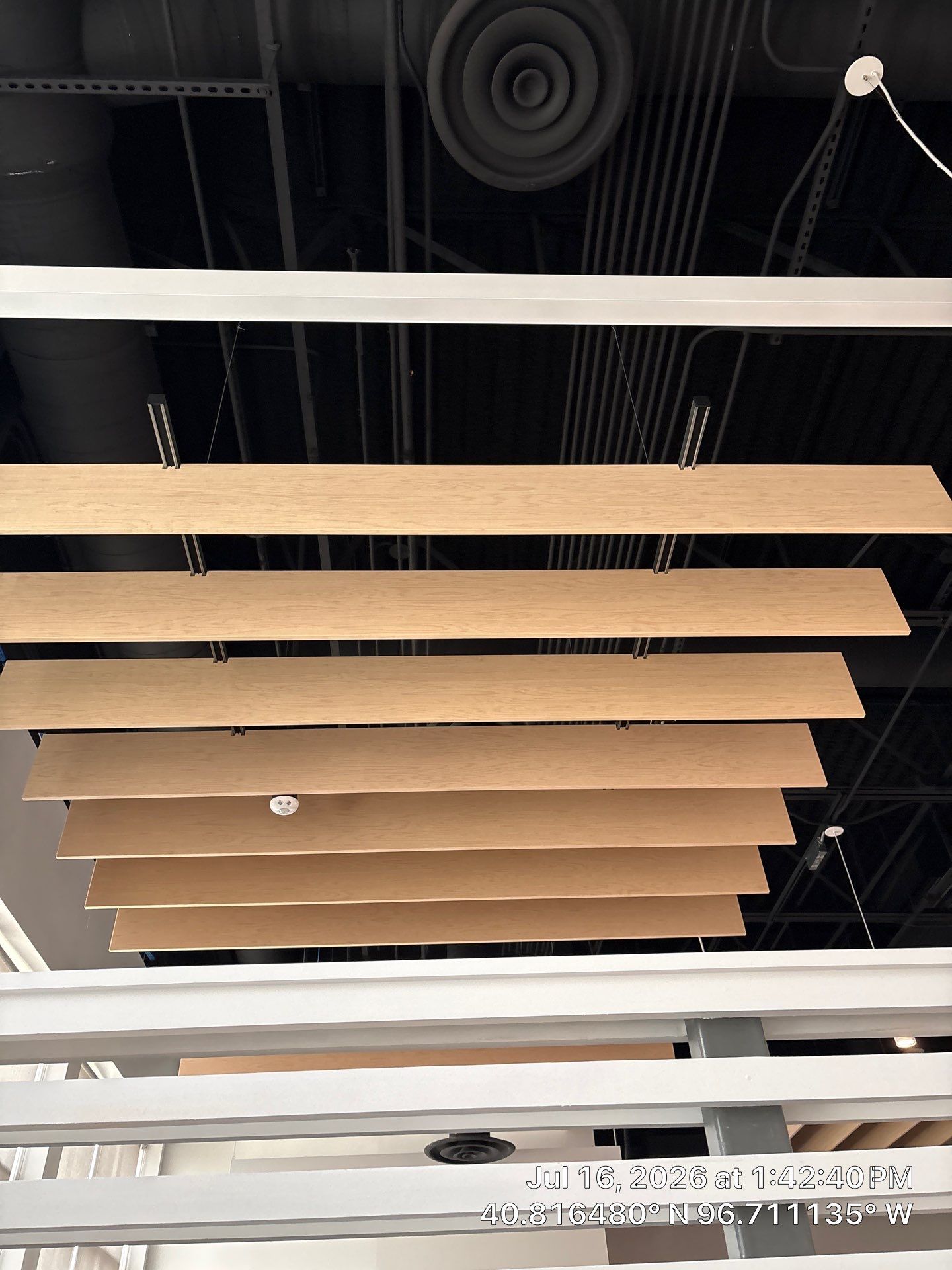 Commercial Office Interior Upgrades Featuring Linear Wood Ceiling Baffles by CompanyCam Sales Demo