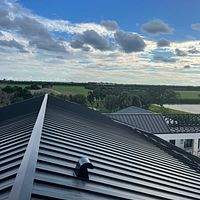 24ga 1.5" Snap-Lock Matte Black   by Total Roofing System The Metal Roof Experts