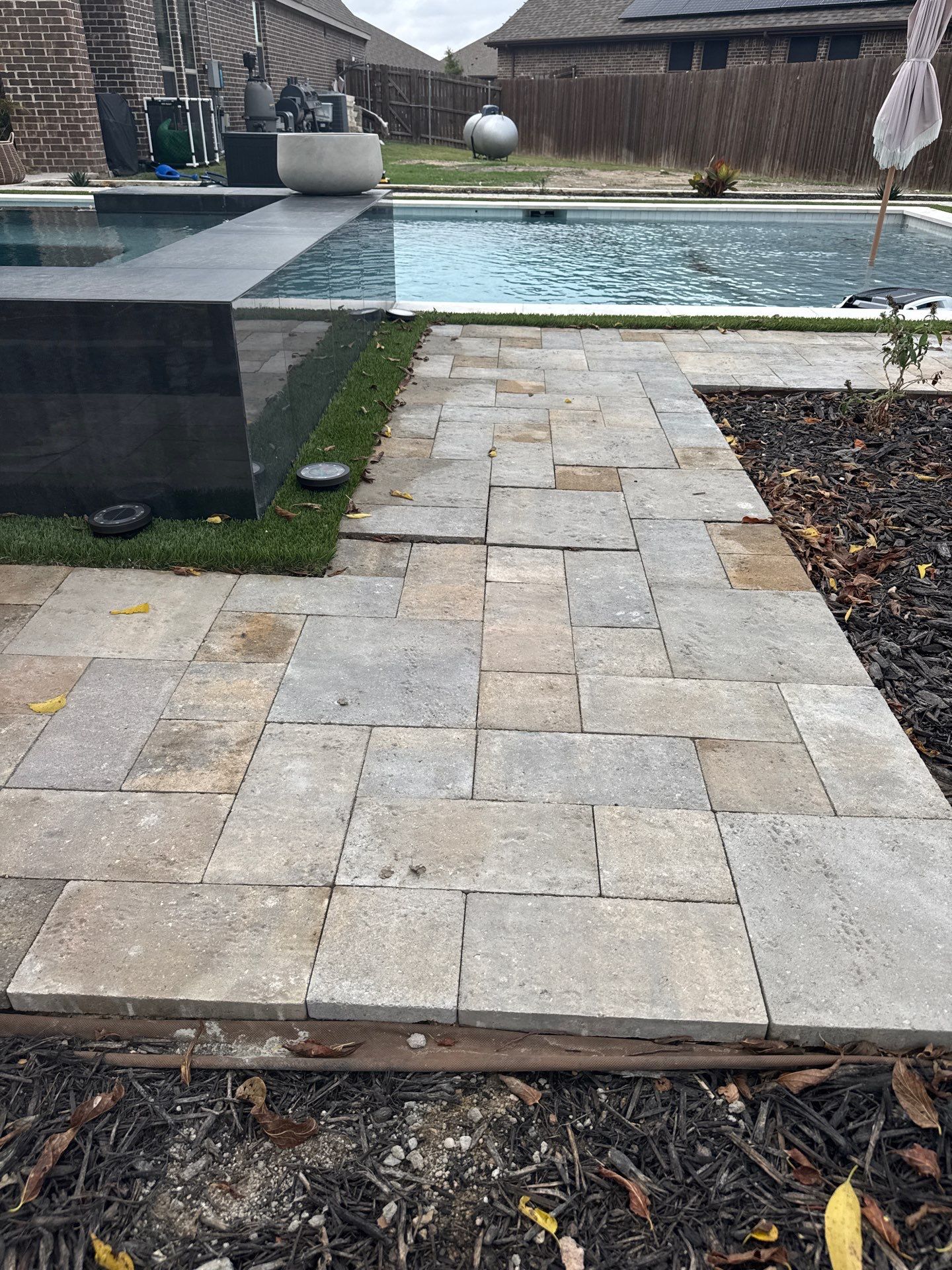 Geometric Pool with Raised Spa, Turf and Outdoor Kitchen by Pinnacle Pools and Spas - DFW
