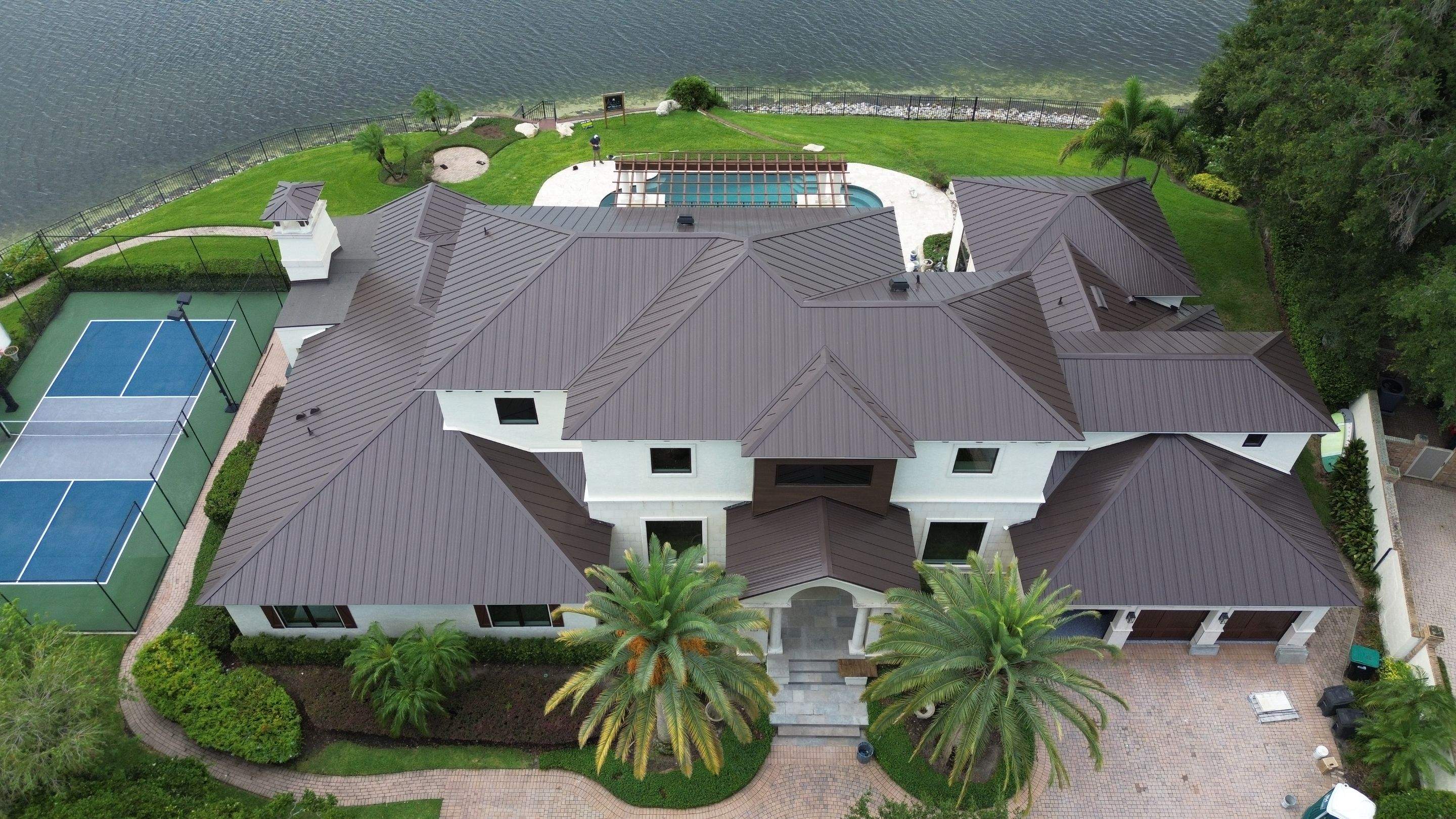 Standing seam metal roof on Lake Conway FL by Gold Key Roofing