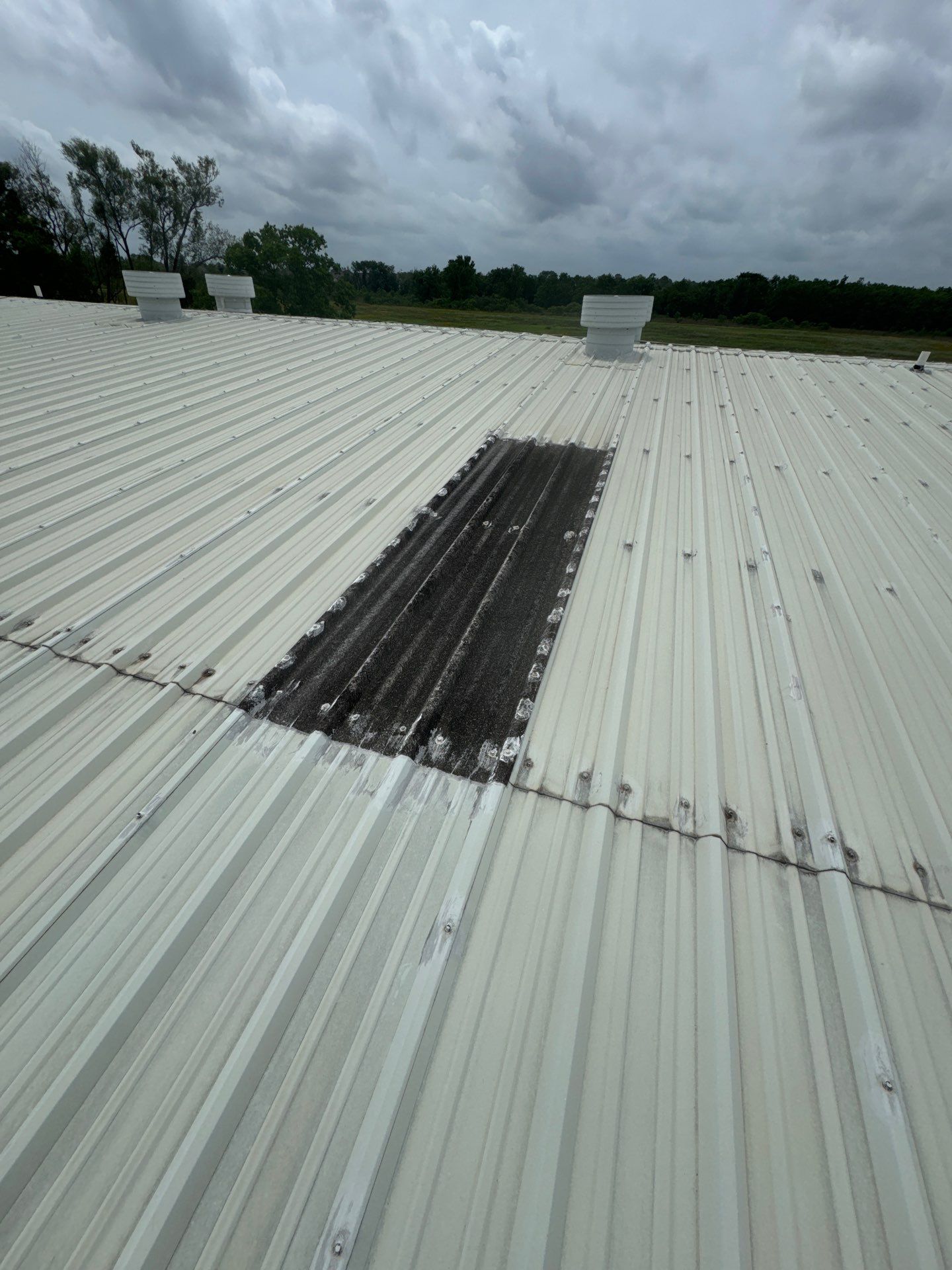 Metal Roof Maintenance- Skylight Installation  by Associates Roofing Unlimited 
