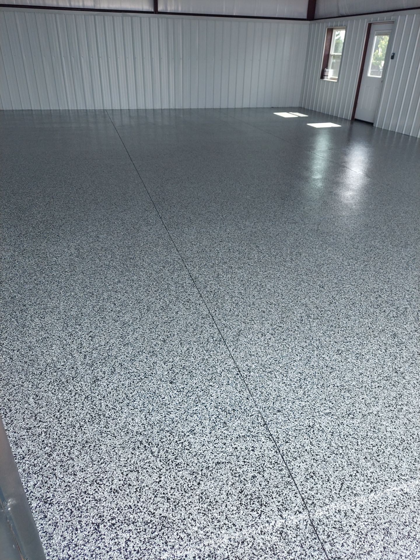 Garage Floor Coating with Domino by Copperhead Coatings