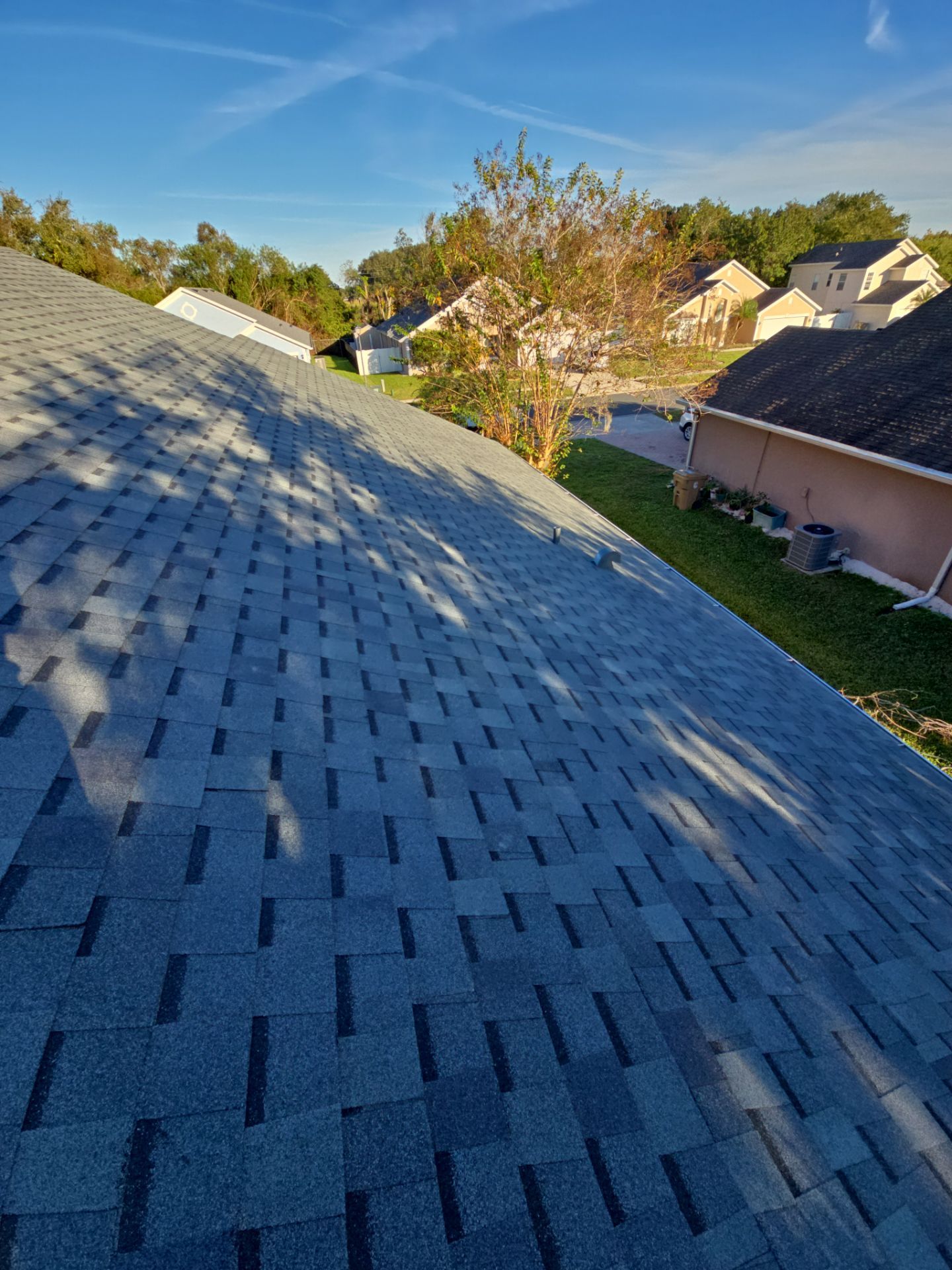 Atlas Pinnacle Pristine Architectural Shingle Roof Replacement in Kissimmee by Fortified Roofing Solutions Corp.