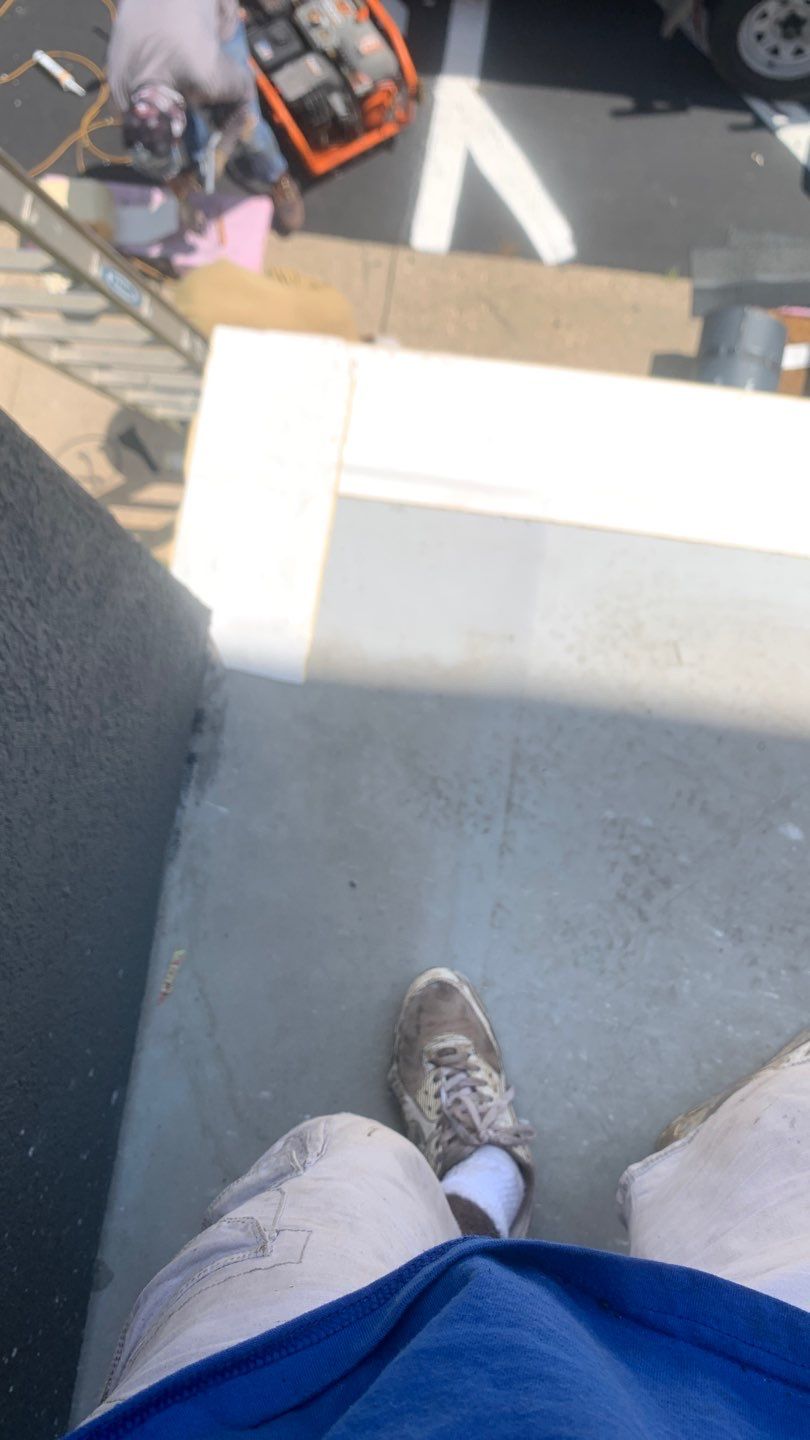 Commercial Roofing Installation using Roof Replacement by American Roofing & Construction LLC