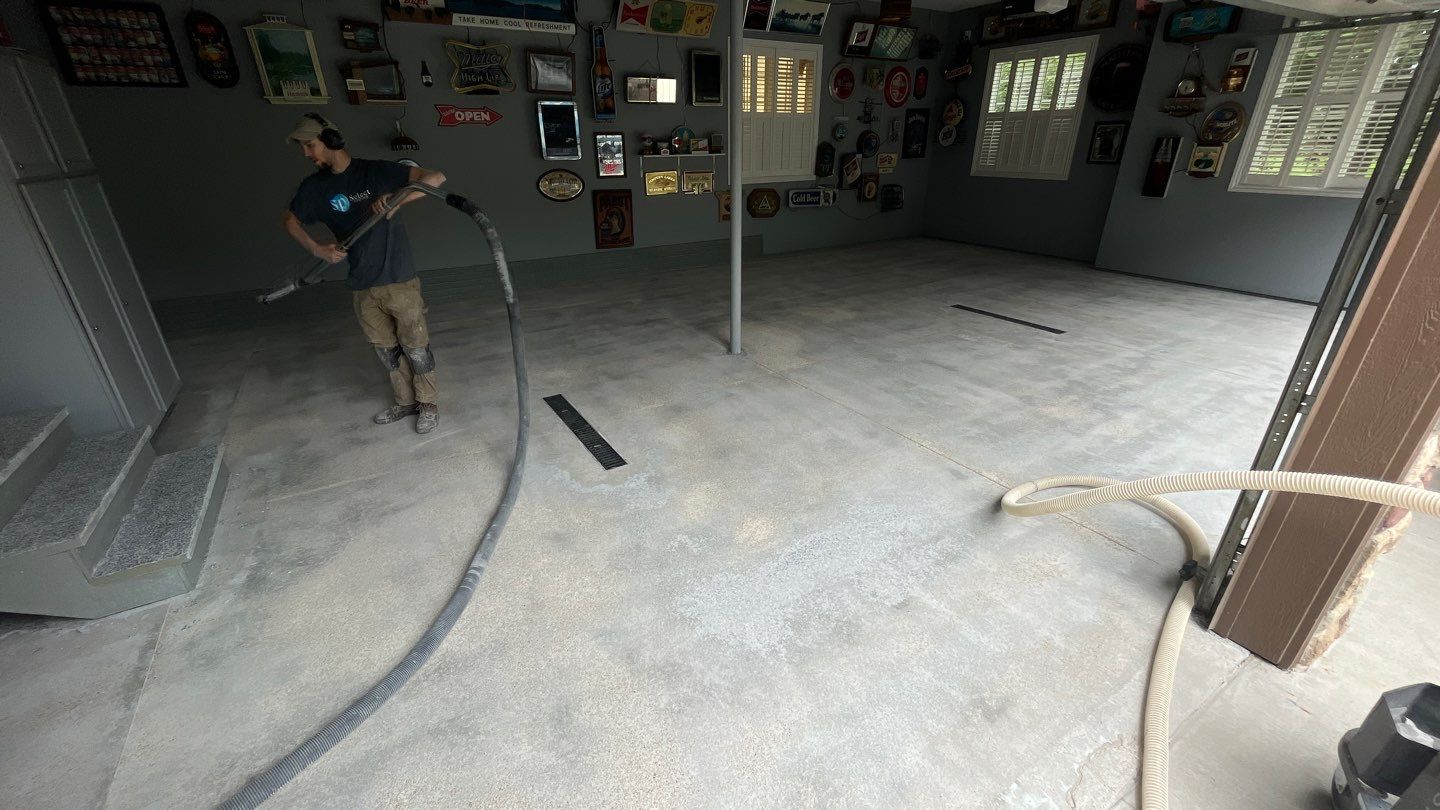 Garage using Orbit by Select Painting, Coatings & Garage Cabinets
