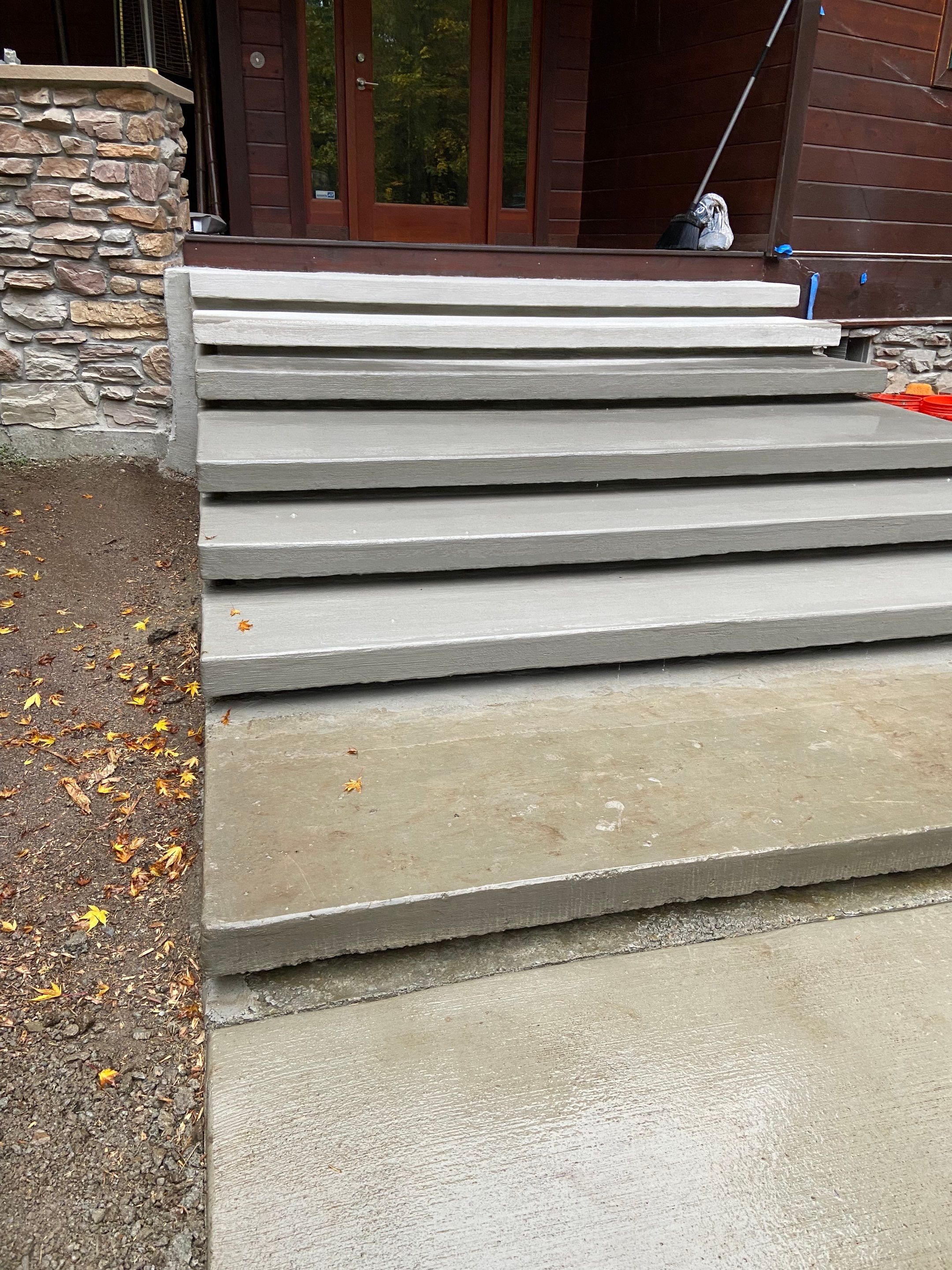 Pia | Custom Concrete Driveway, Walkway & Floating Steps by Jireh Asphalt & Concrete Inc 