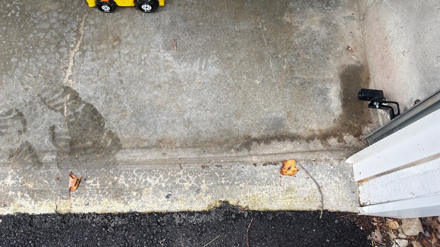 Garage in Londonderry, NH 03053 by Symphony Concrete Coatings