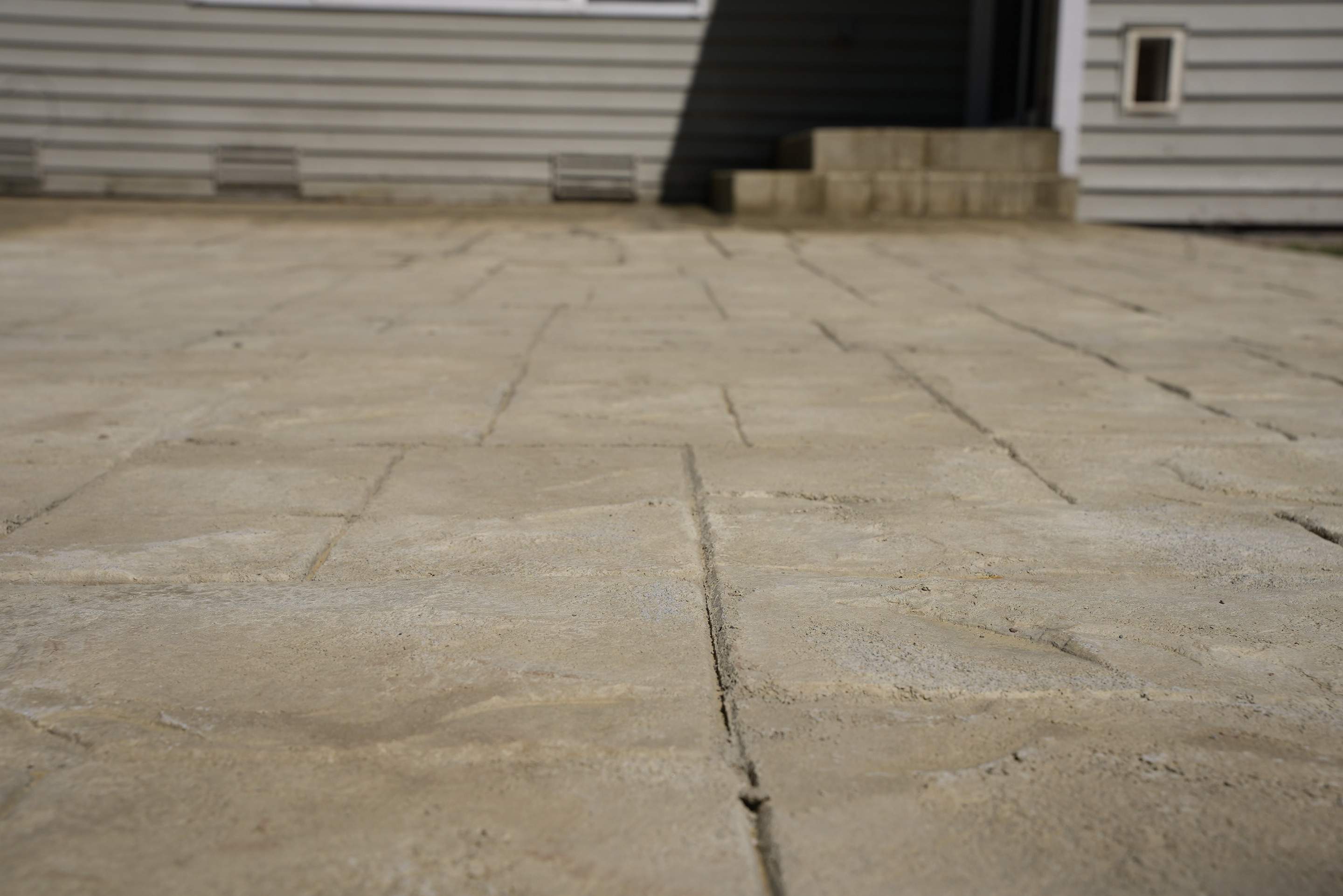 Benedict | Stamped Concrete Back Patio by Jireh Asphalt & Concrete Inc 