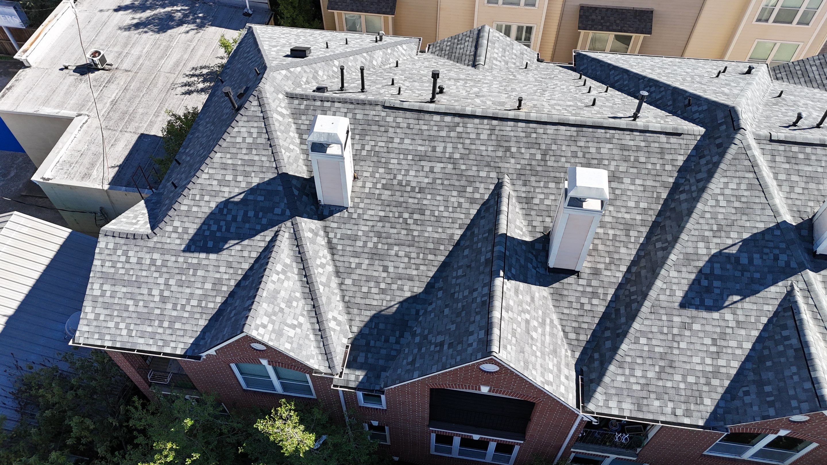 Townhome Complex Roof Replacement in the heart of Houston! by Core Four Roofing