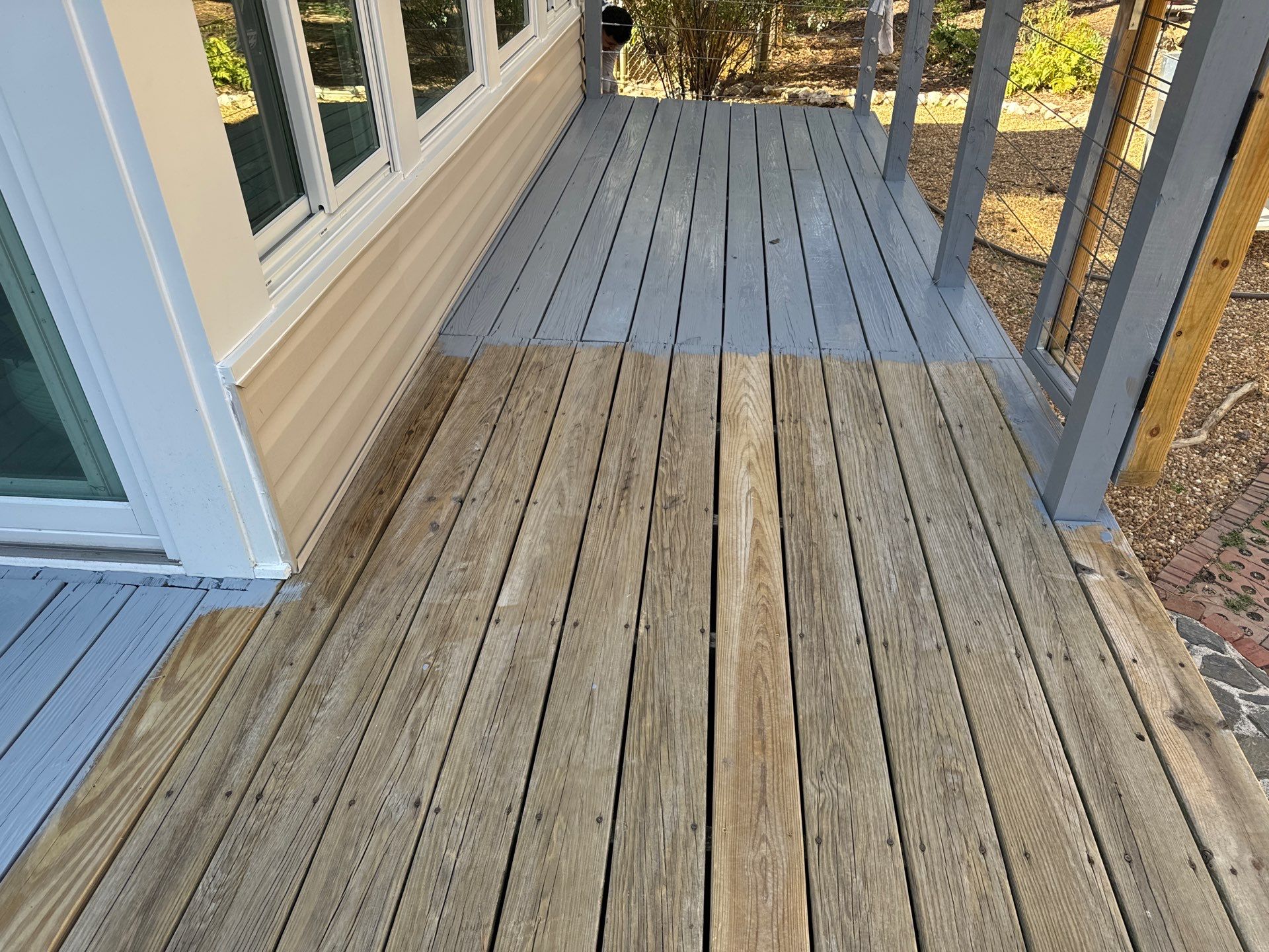 Deck staining by GonzalezPainters & Contractors Inc 