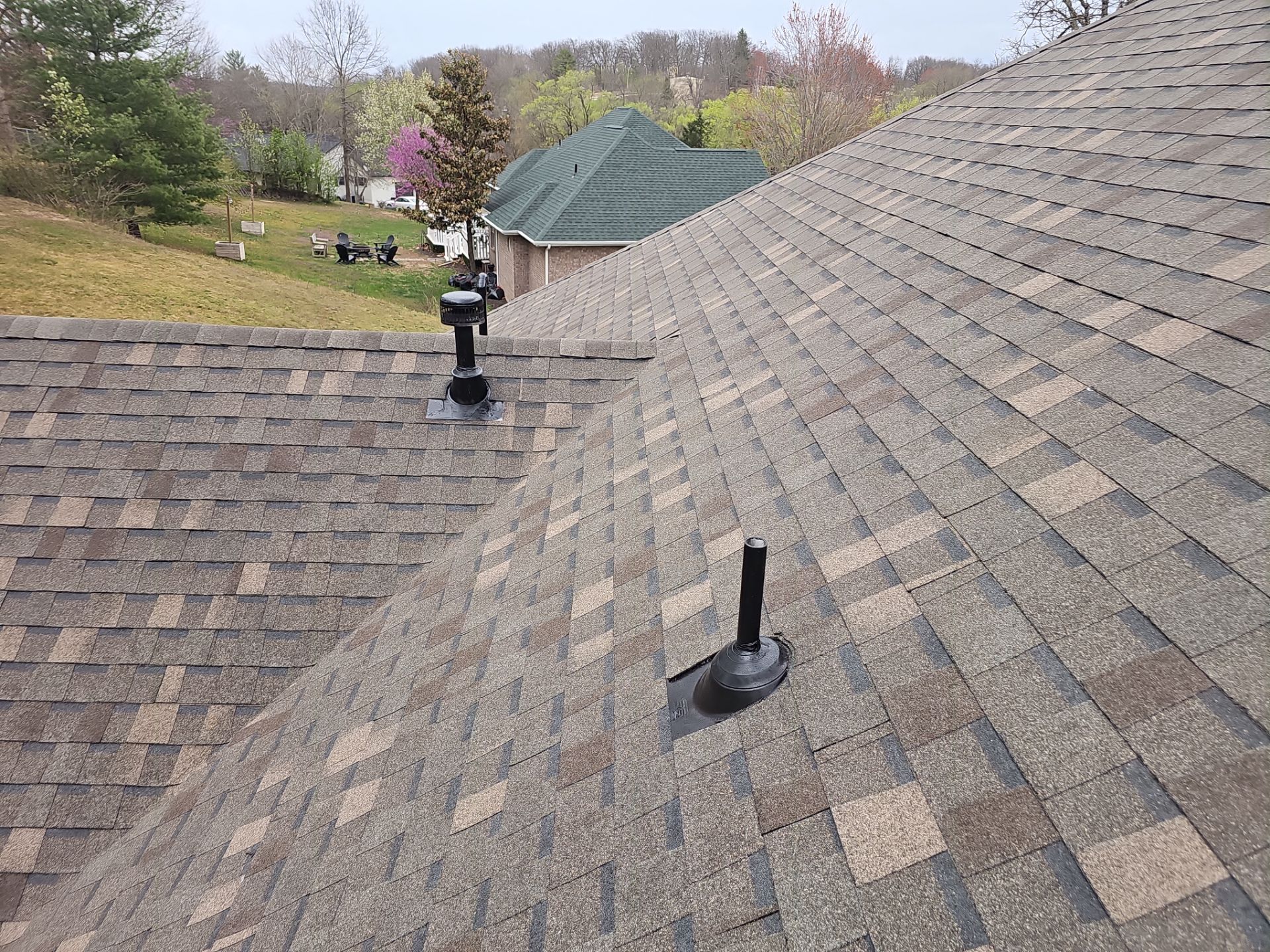 Residential Roof + Gutters & Downspouts Install  by Titan Commercial & Residential Roofing 