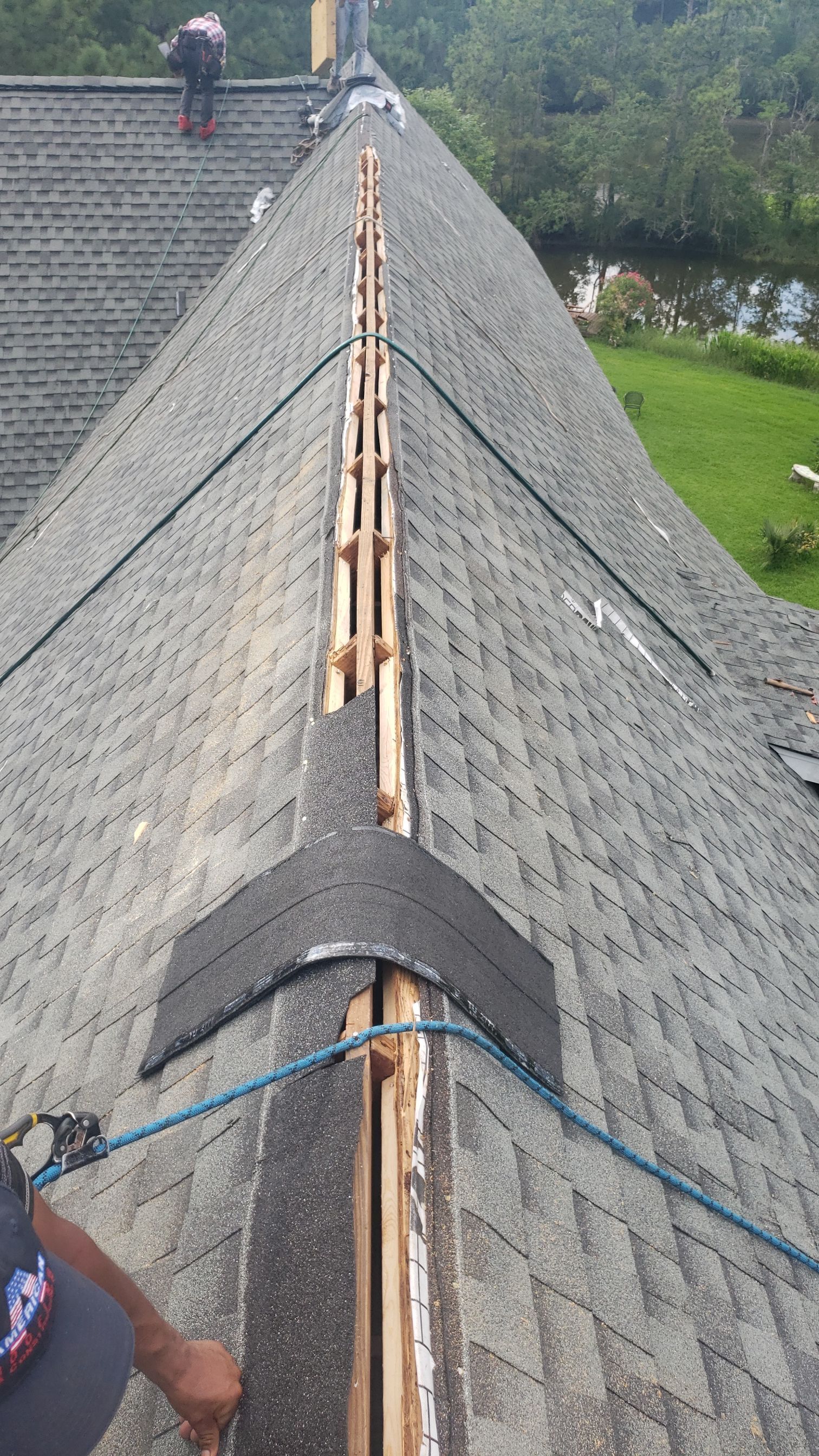 Residential Roofing Installation using Roof Replacement by American Roofing & Construction LLC