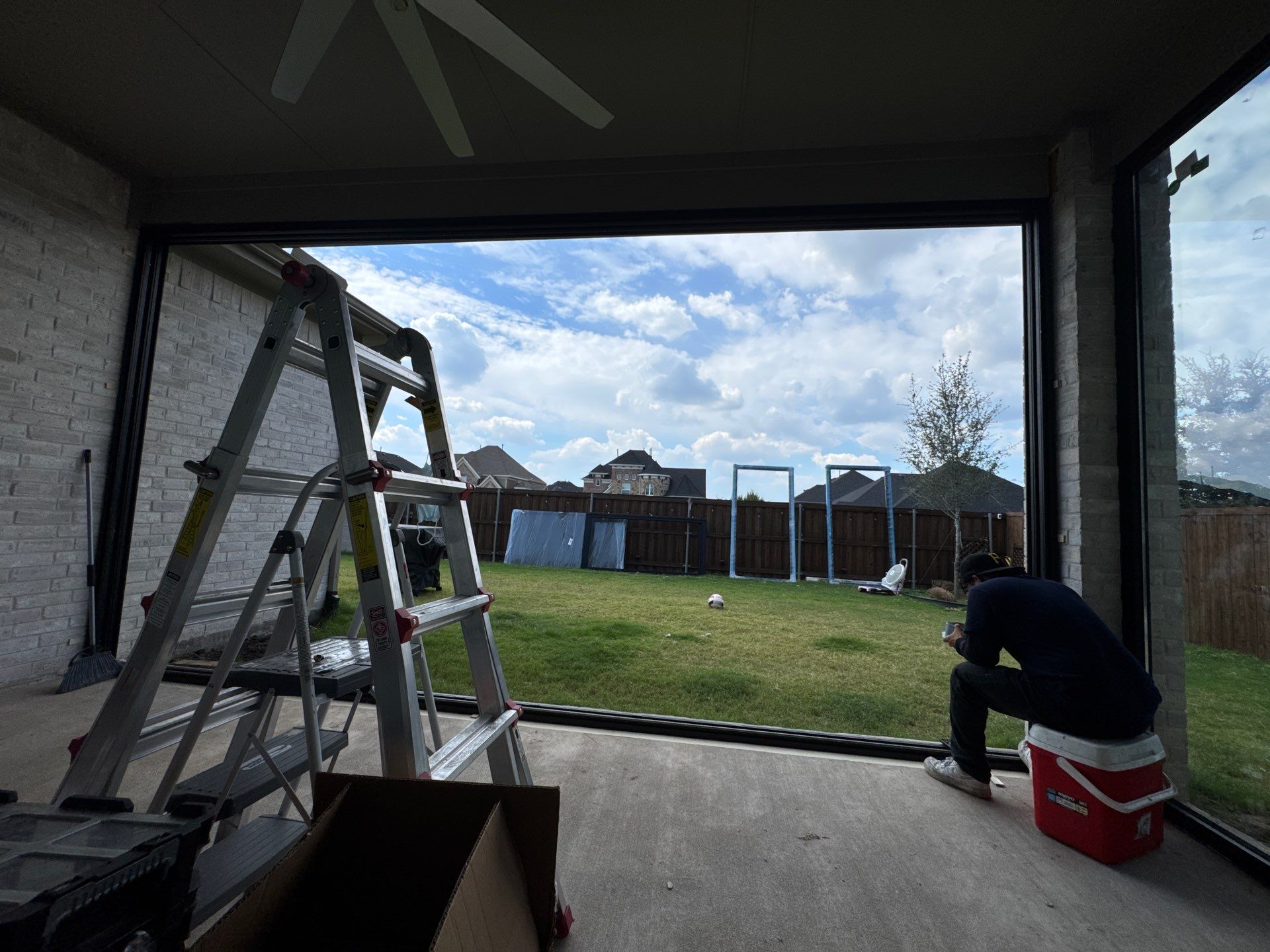 Year-Round Bonus Room: Patio Enclosure Featuring 16ft Seamless Sliding Glass by Tibi Soli LLC